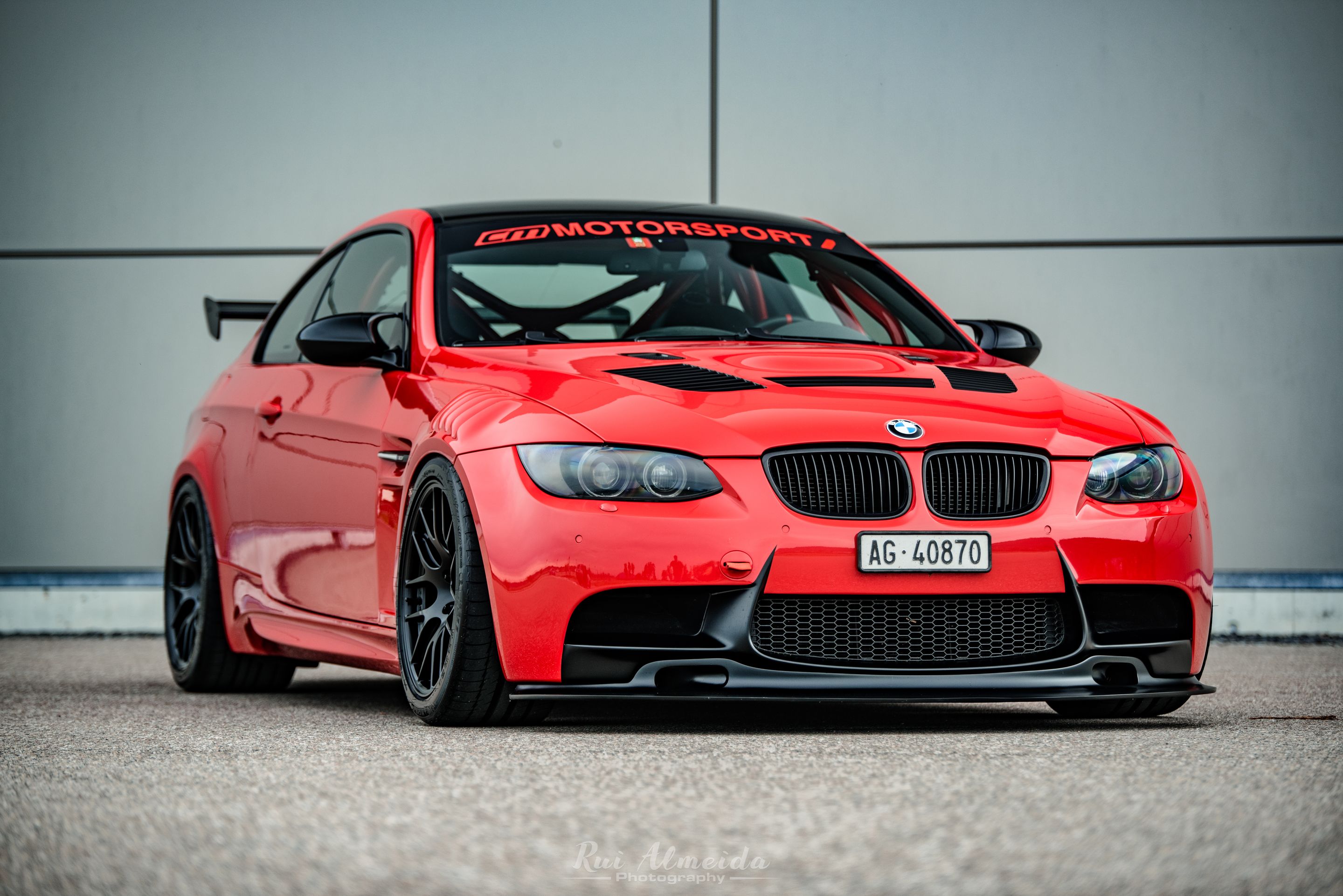 Red BMW E92 Coupe M3 with 18" EC-7R Apex wheels in Satin Black