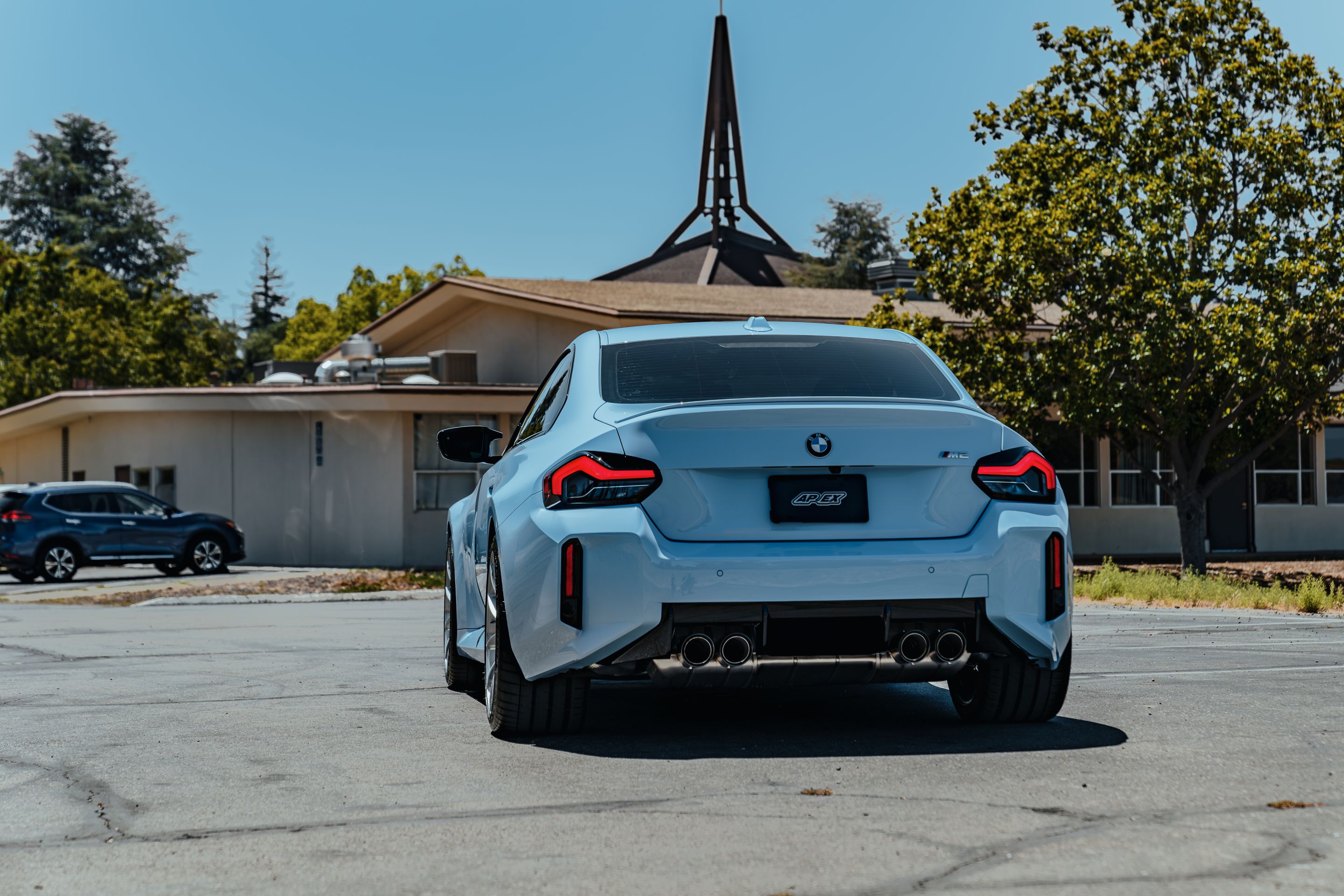Blue BMW G87 M2 with 20" VS-5RS Apex wheels in Brushed Clear