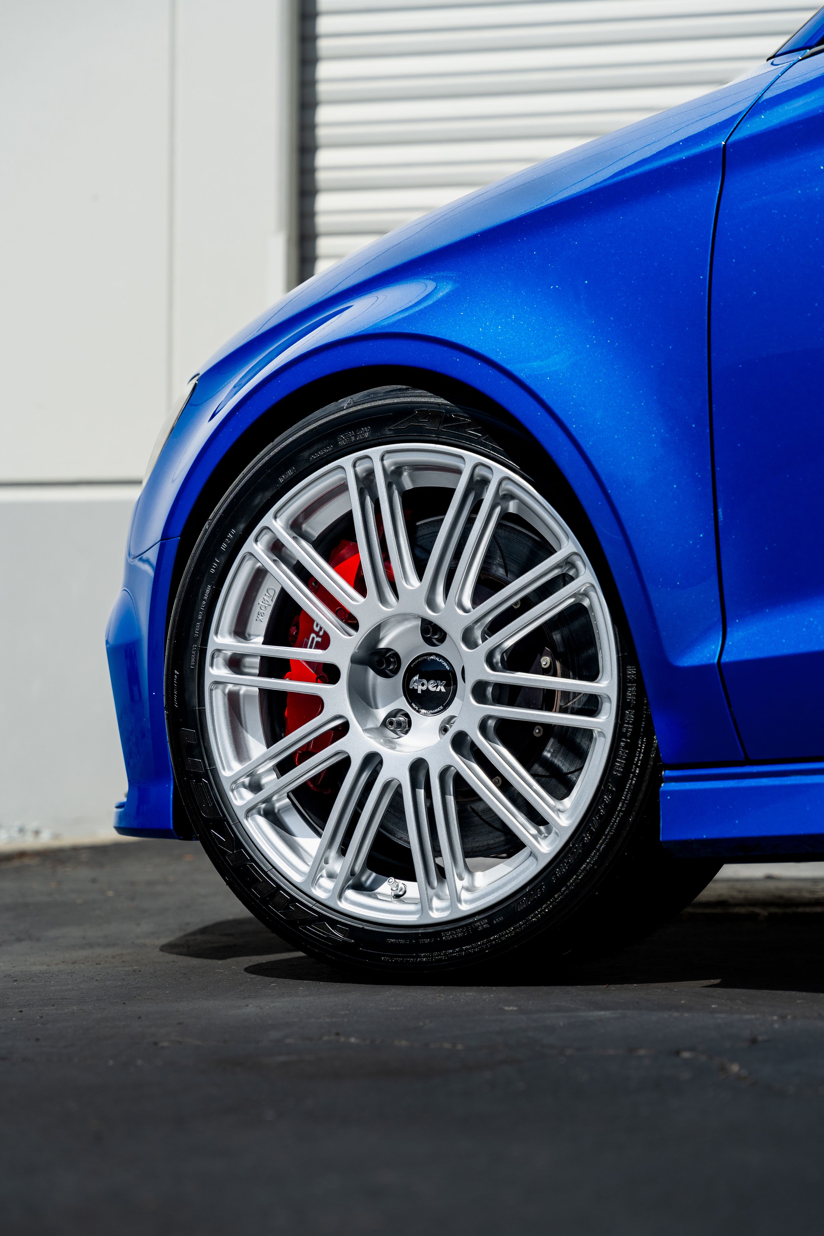 Blue Audi 8V RS 3 with 18" TC-10RT Apex wheels in Race Silver