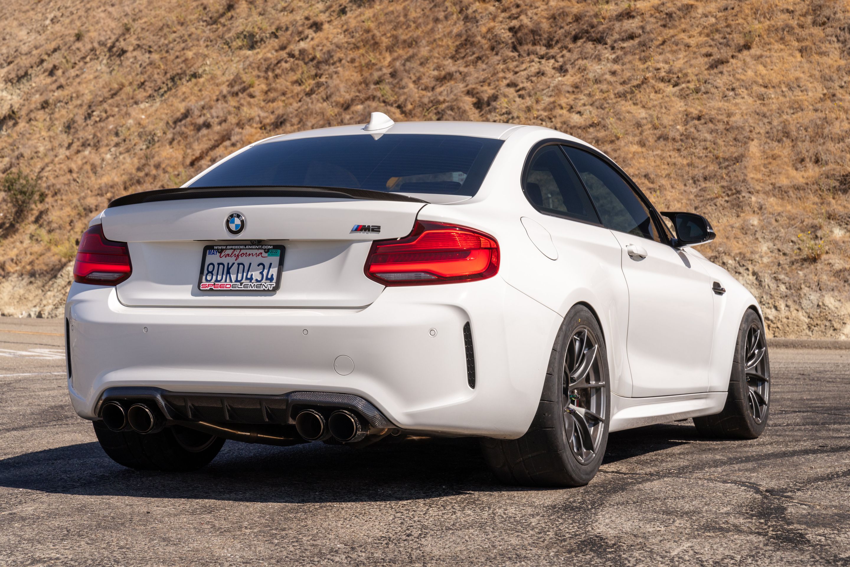 White BMW F87 M2 with 18" VS-5RS Apex wheels in Anthracite