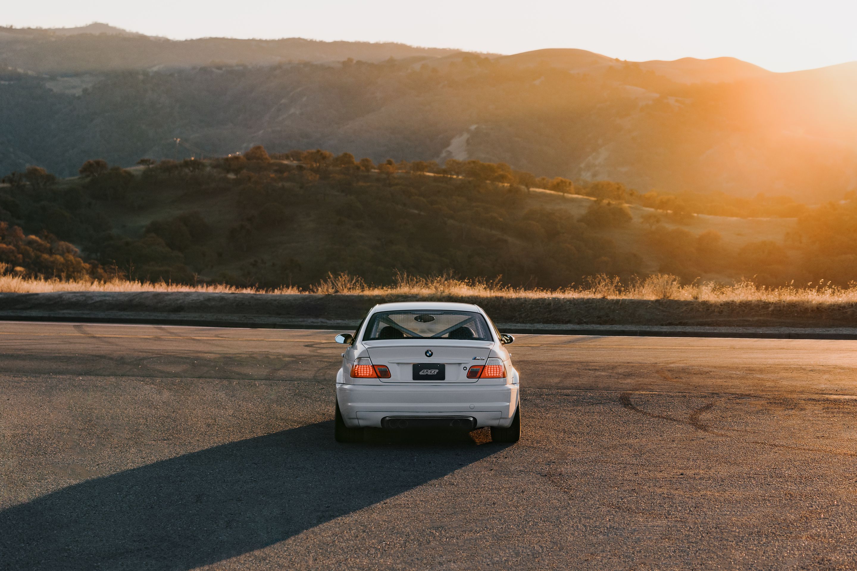 White BMW E46 M3 with 18" EC-7 Apex wheels in Race Silver