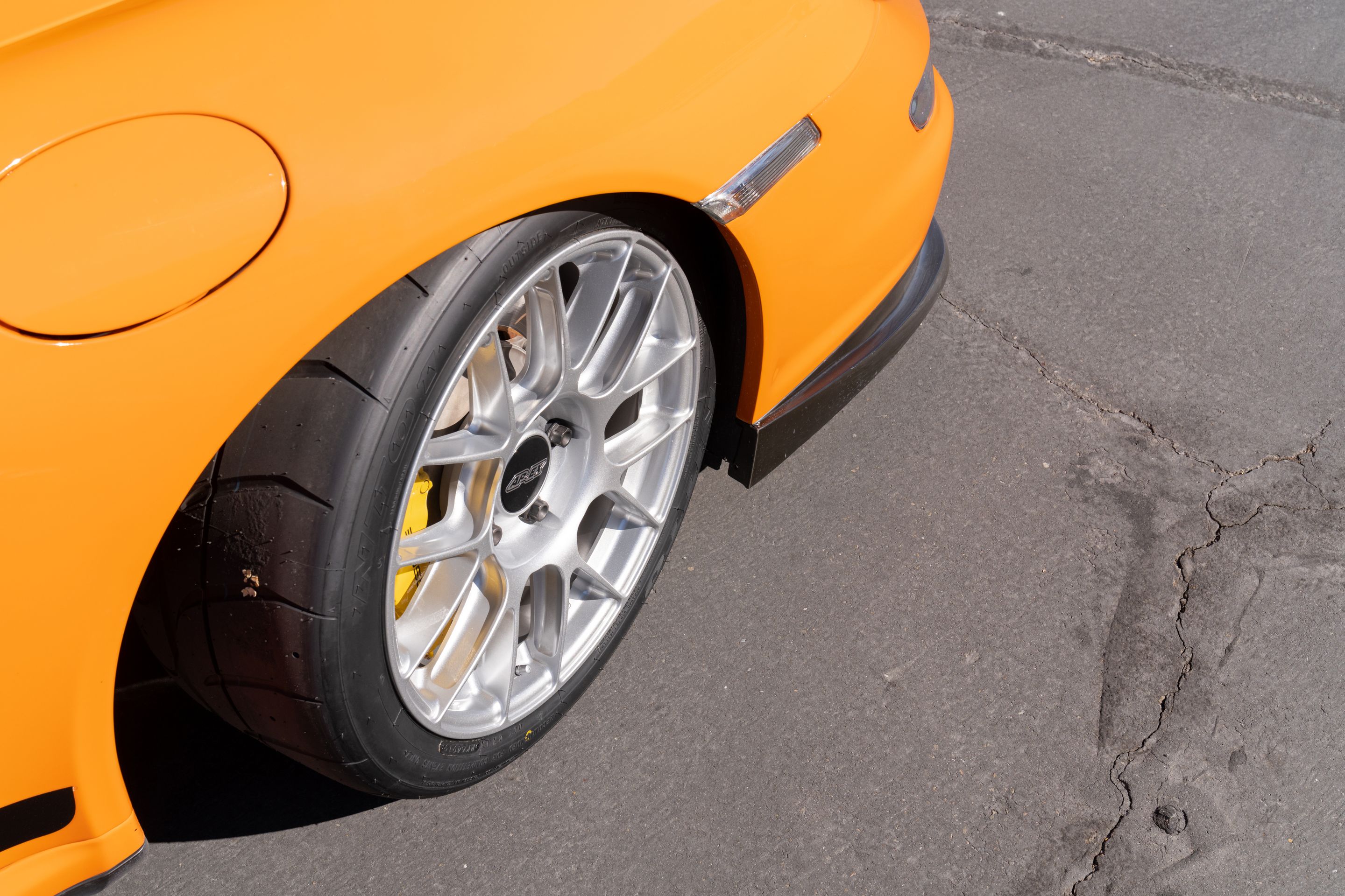 Orange Porsche 911 997 GT3 RS with 18" EC-7RS Apex wheels in Race Silver