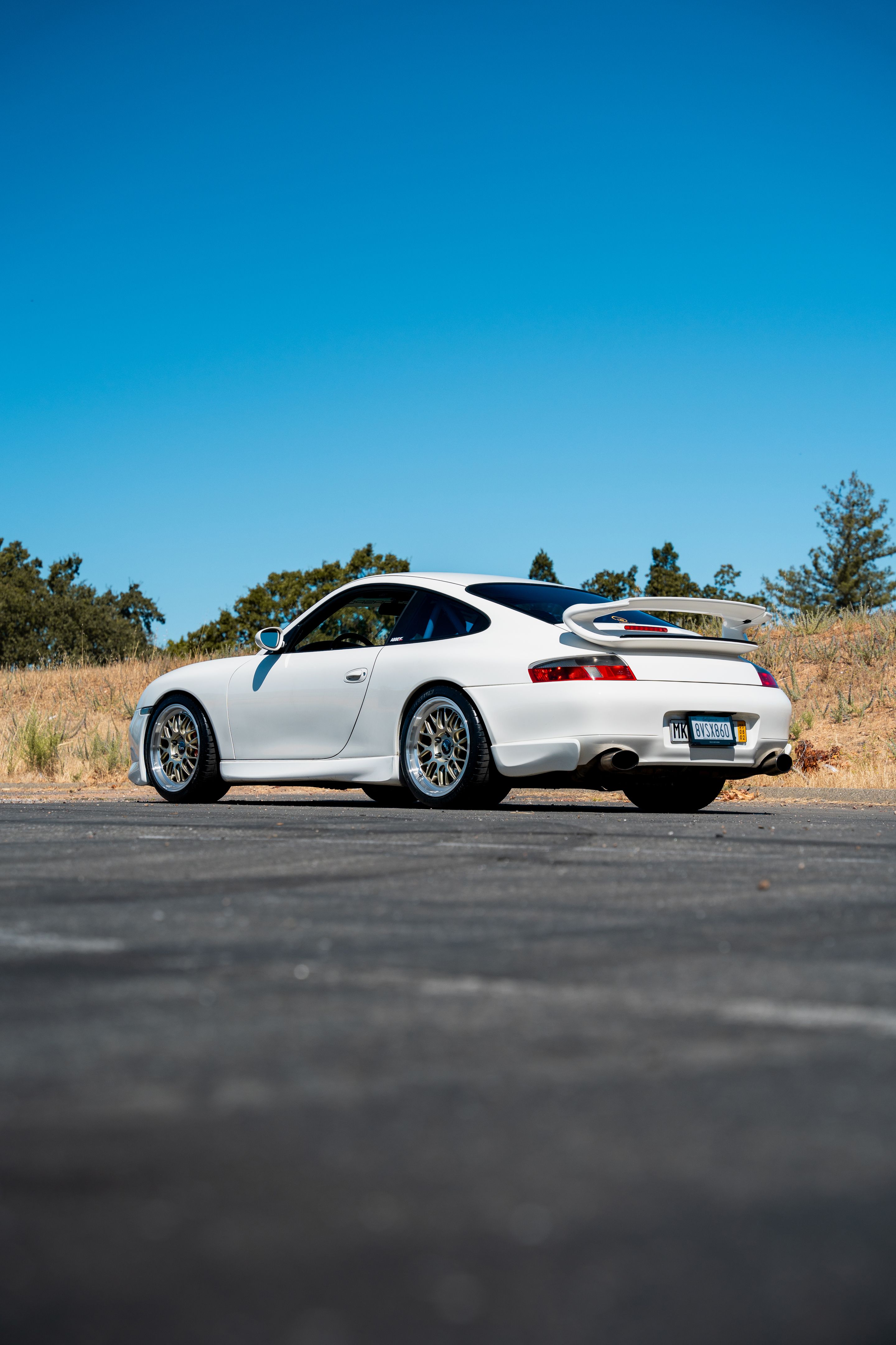 White Porsche 911 996 Carrera with 18" ML-10RT Apex wheels in Machined Lip Gloss Motorsport Gold