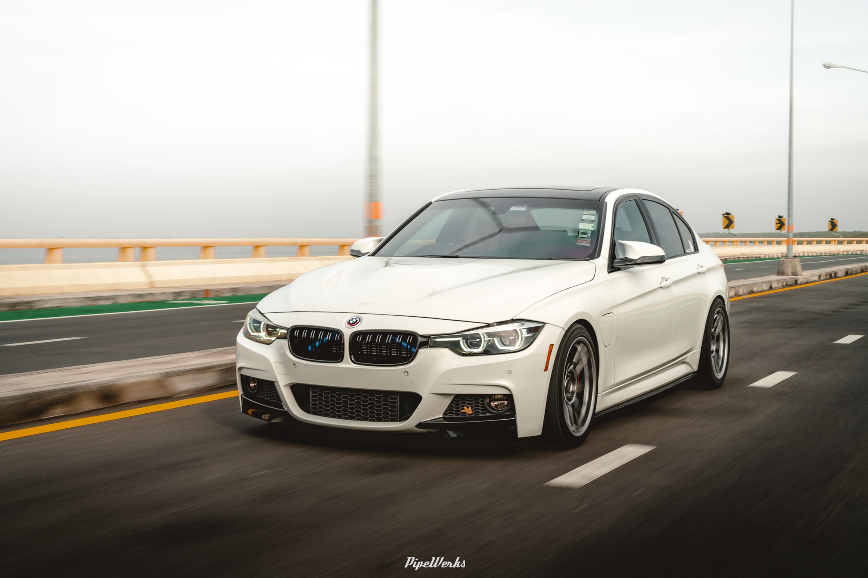 White BMW F30 Sedan 3 Series with 18" ARC-8 Apex wheels in Hyper Black