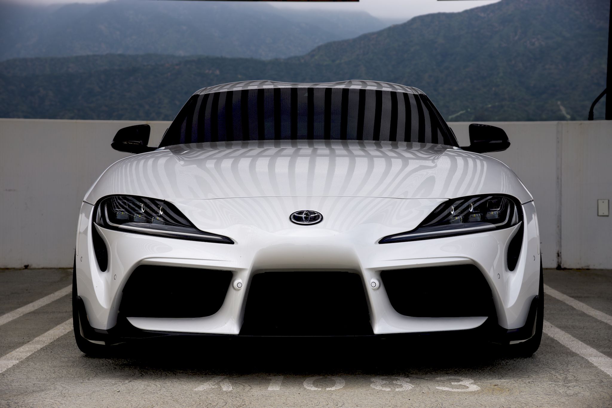 White Toyota GR Supra with 19" VS-5RS Apex wheels in Satin Bronze