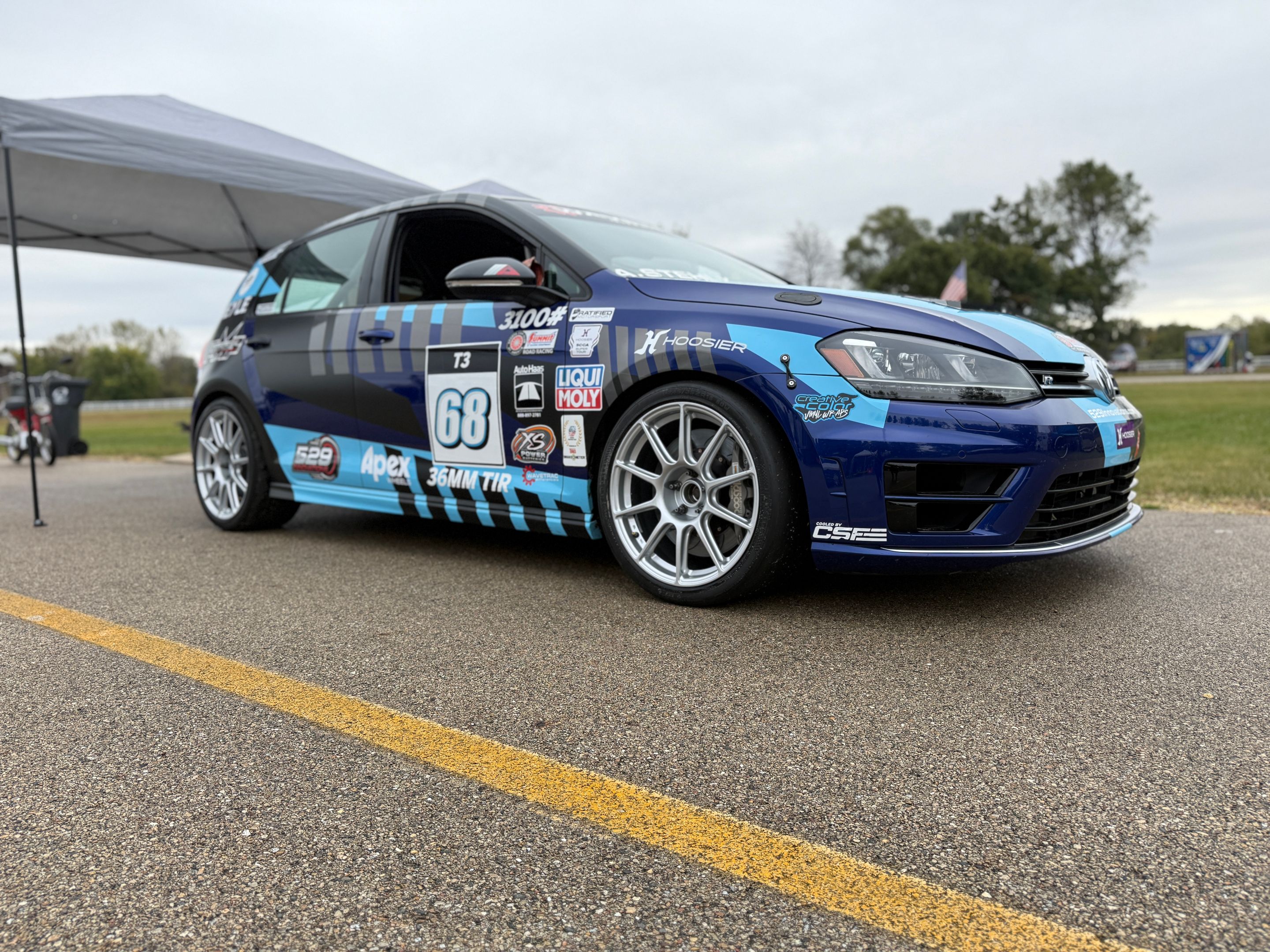 Race Livery VW MK7 Golf R with 18" SM-10 Apex wheels in Race Silver