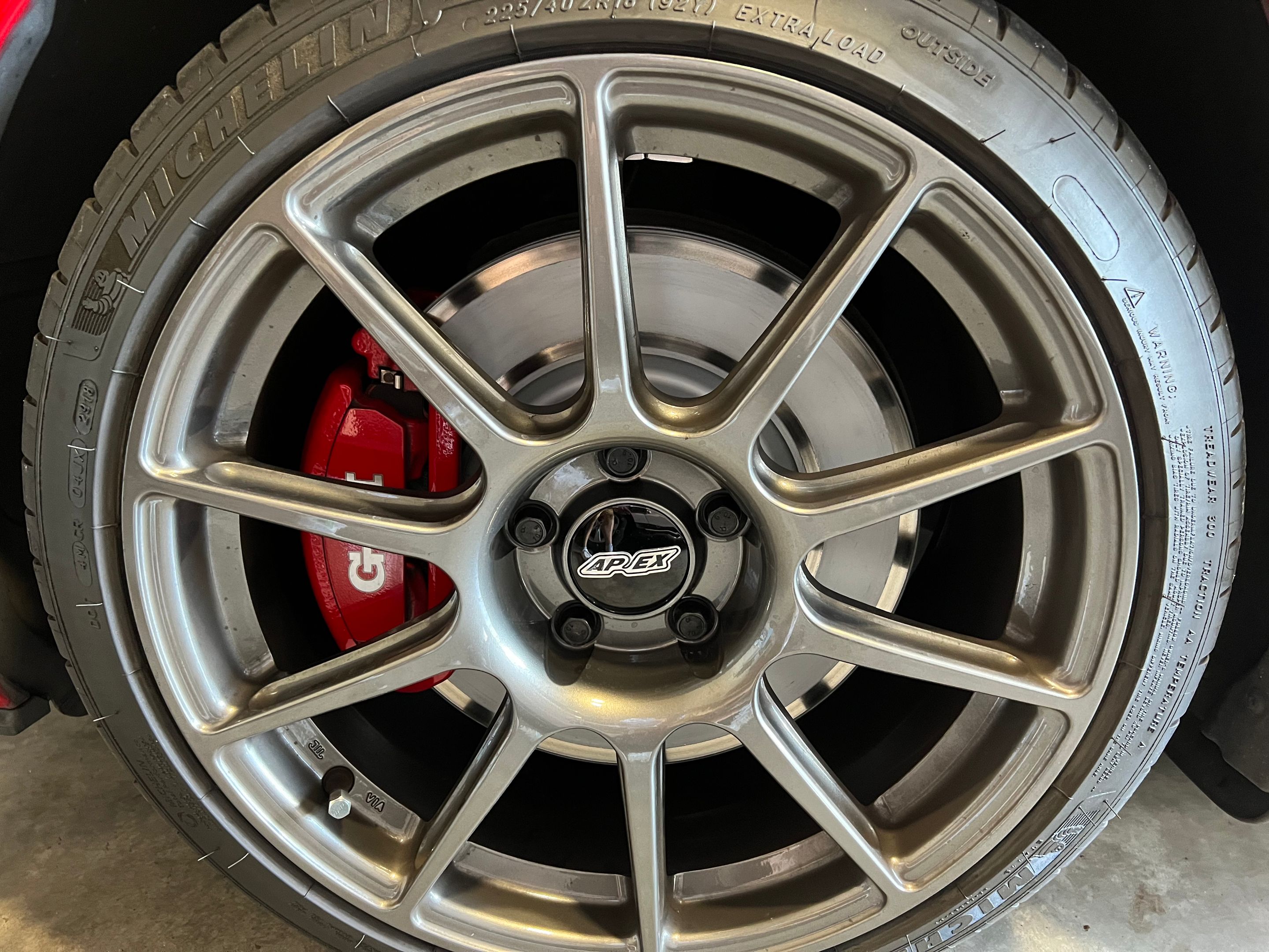 Red VW MK7 GTI with 18" SM-10 Apex wheels in Anthracite