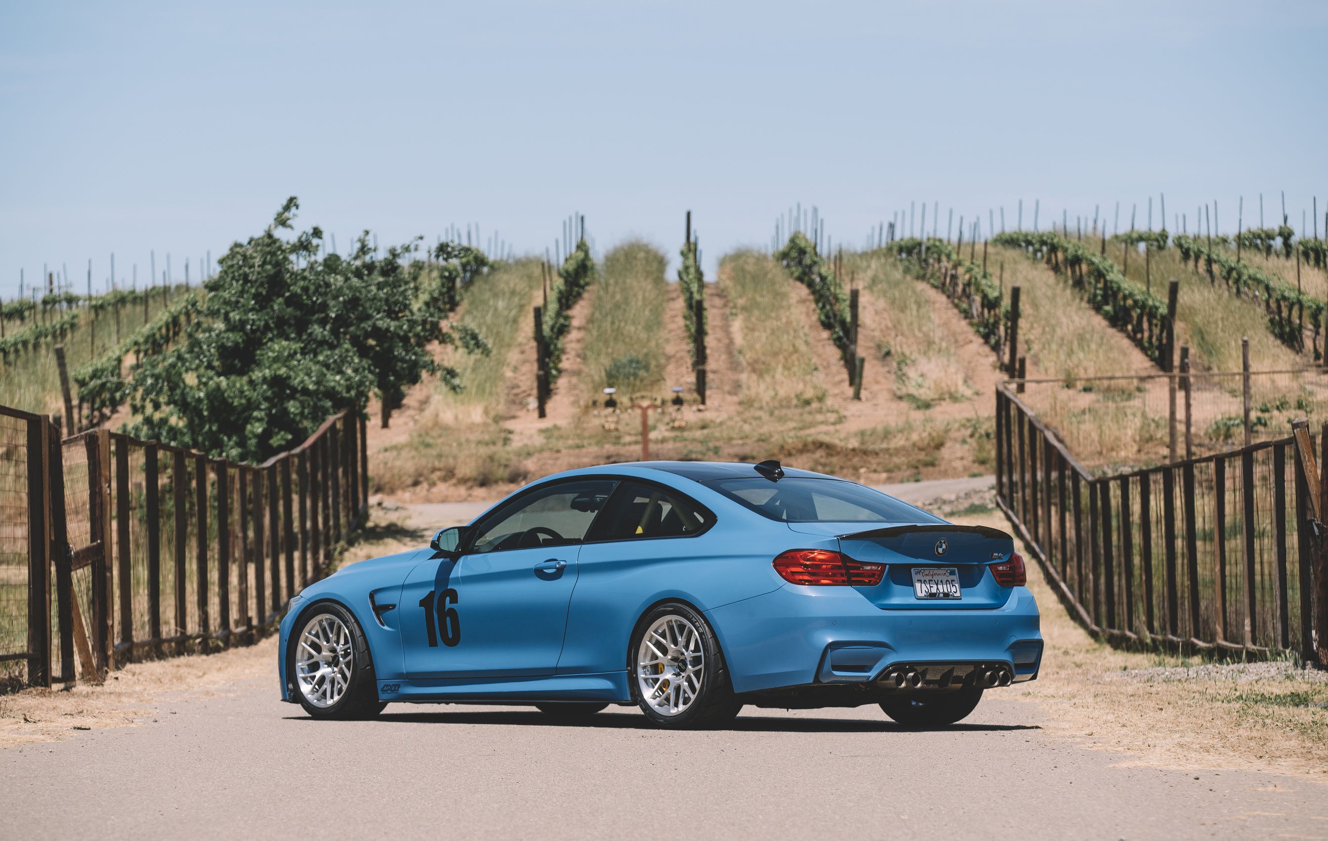 Blue BMW F82 Coupe M4 with 18" ARC-8R Apex wheels in Brushed Clear