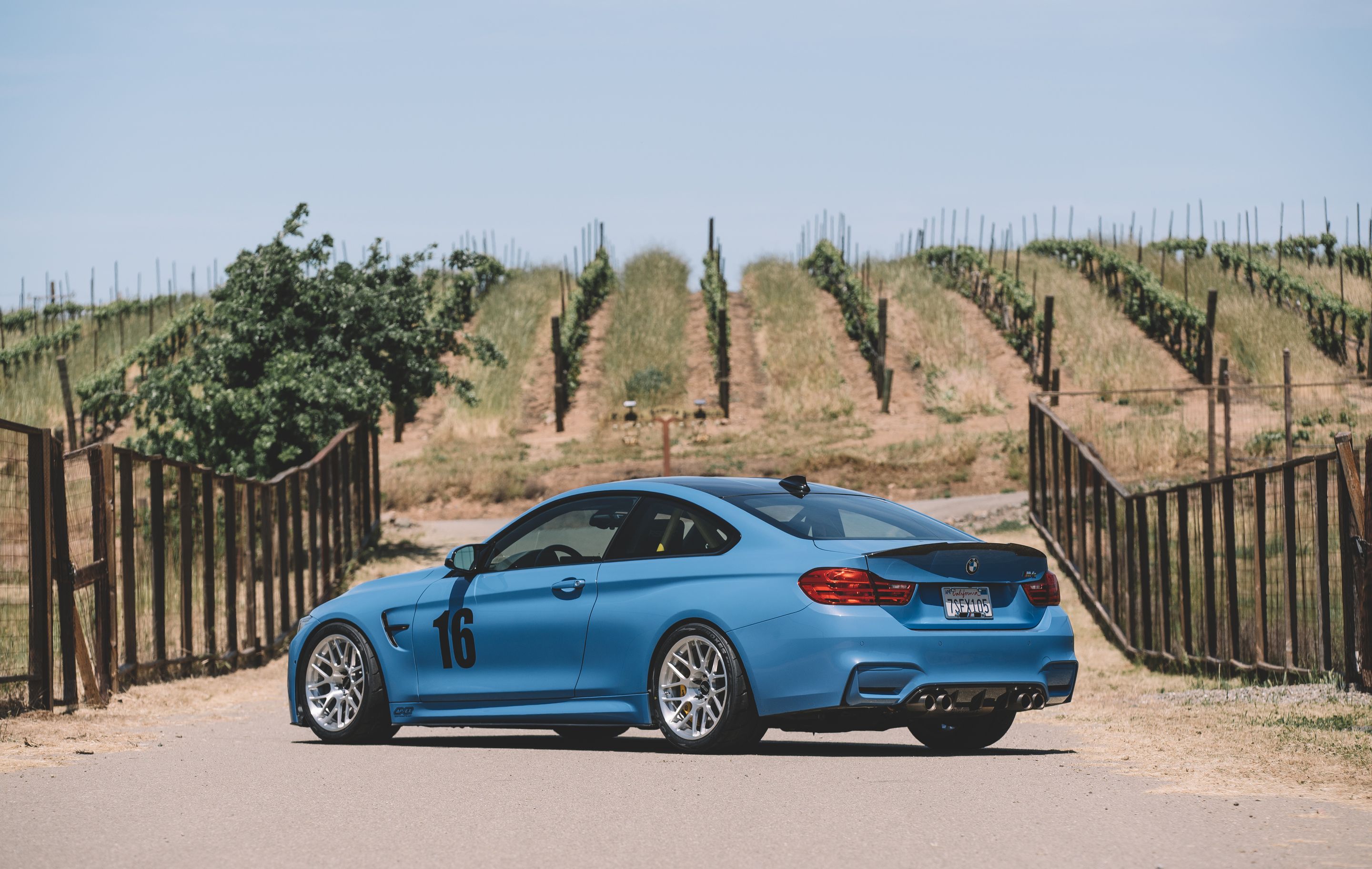 Blue BMW F82 Coupe M4 with 18" ARC-8R Apex wheels in Brushed Clear