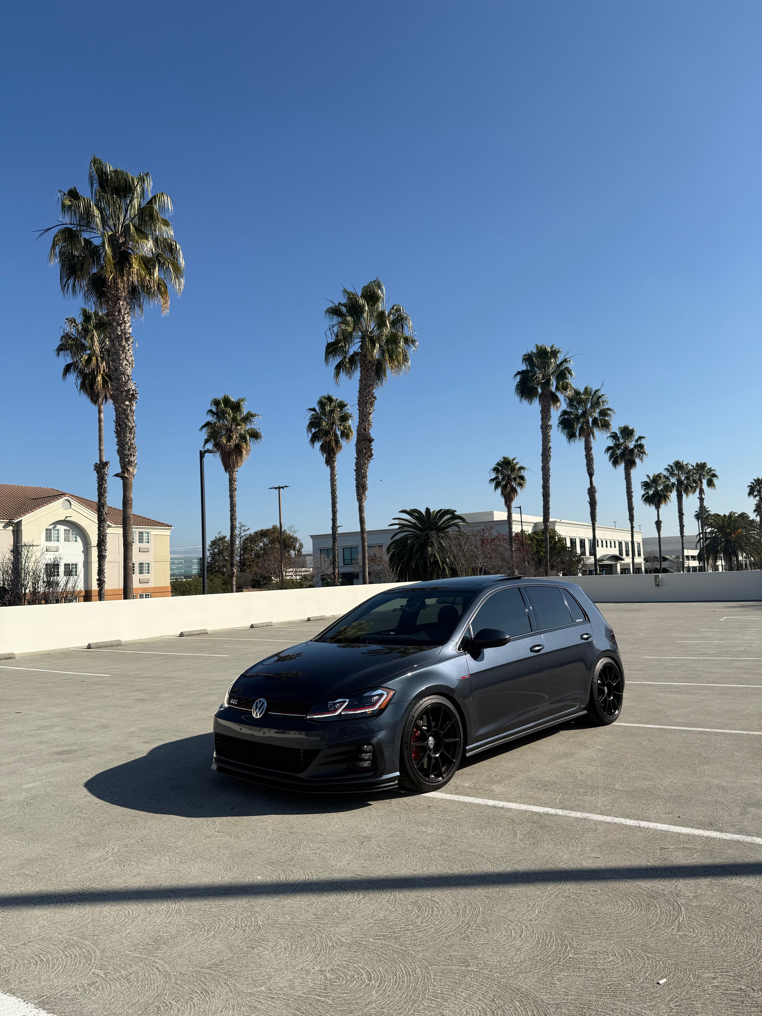 Grey VW MK7 GTI with 18" SM-10 Apex wheels in Satin Black