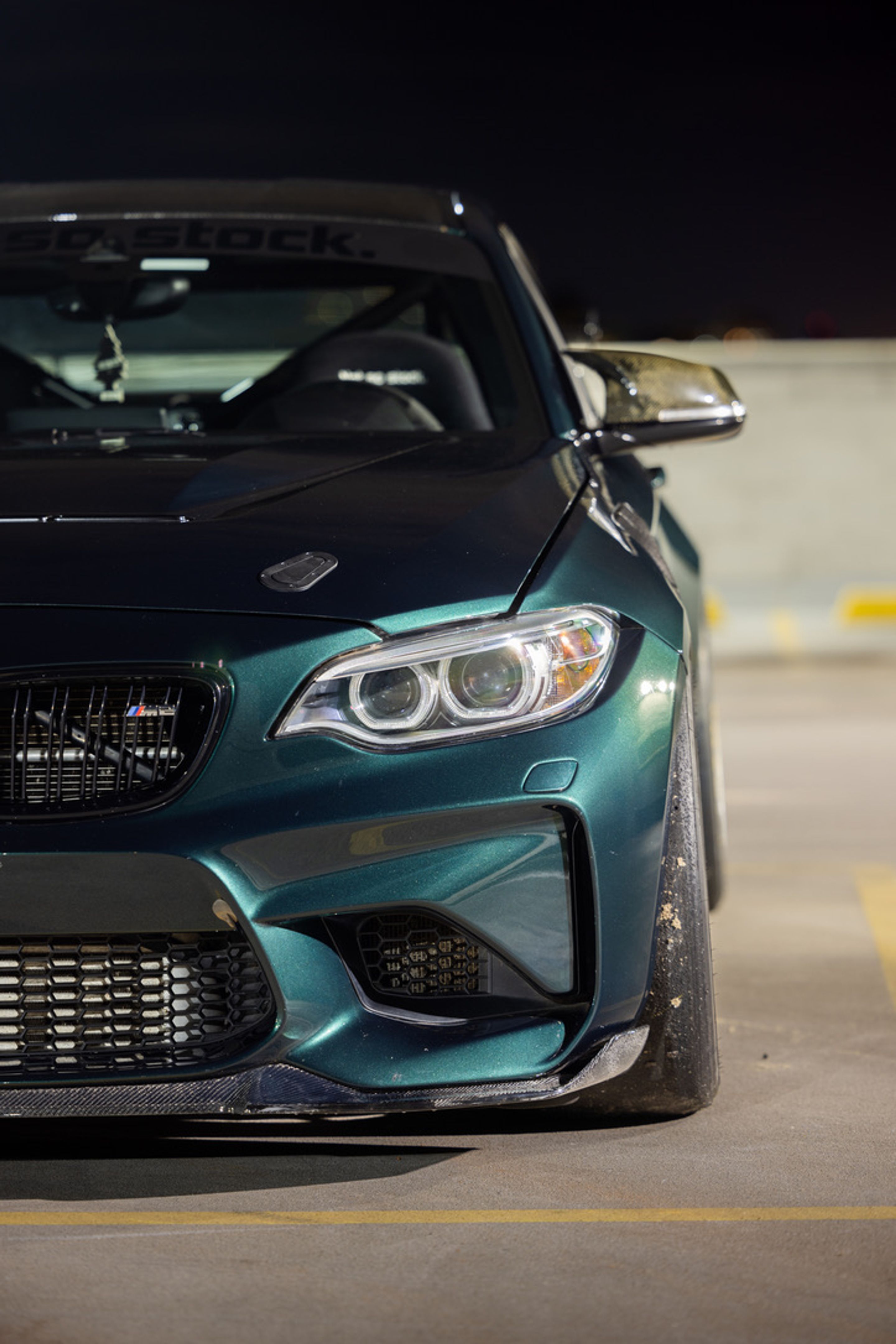 Green BMW F87 M2 with 18" EC-7 Apex wheels in Race Silver