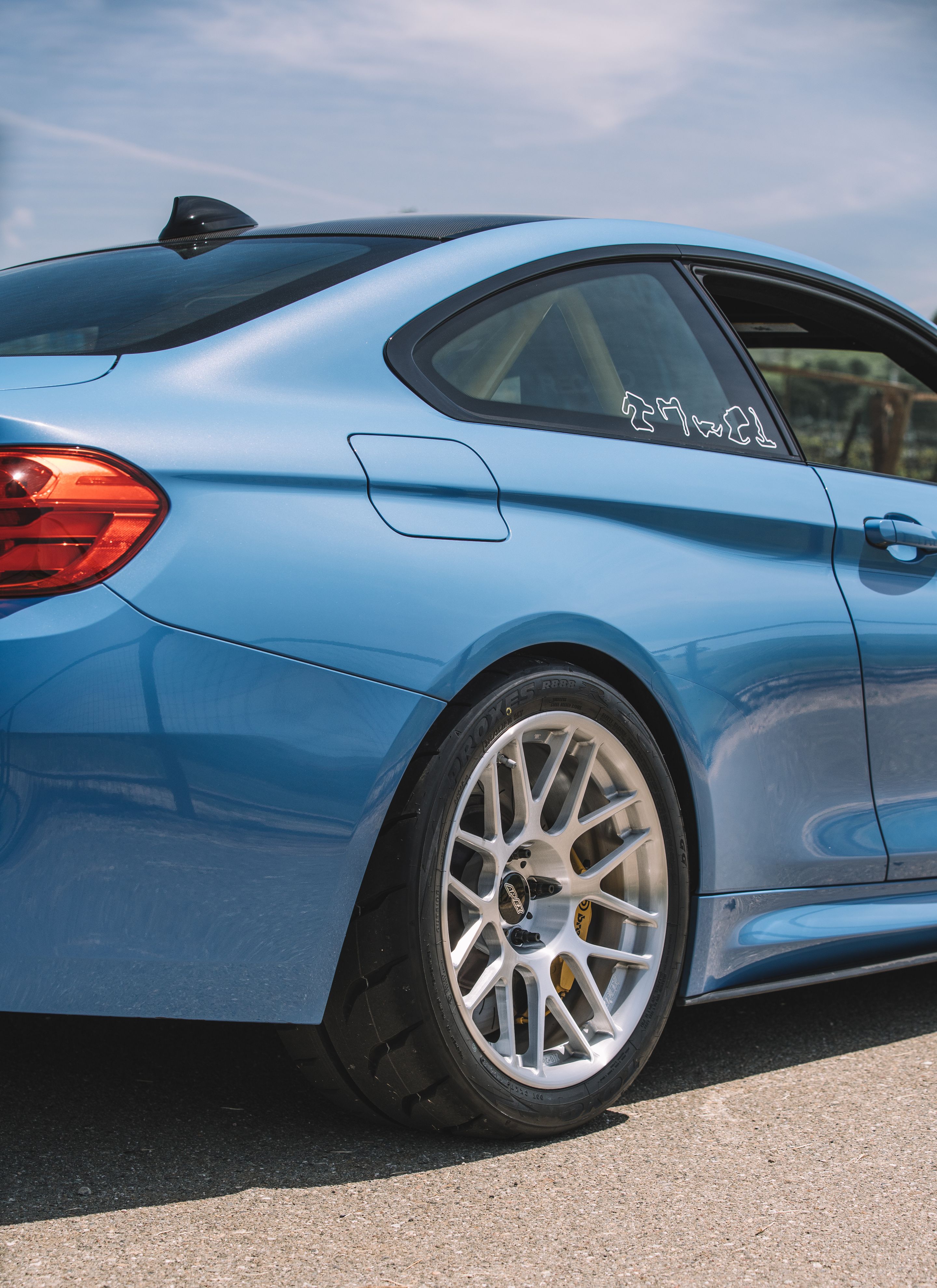 Blue BMW F82 Coupe M4 with 18" ARC-8R Apex wheels in Brushed Clear