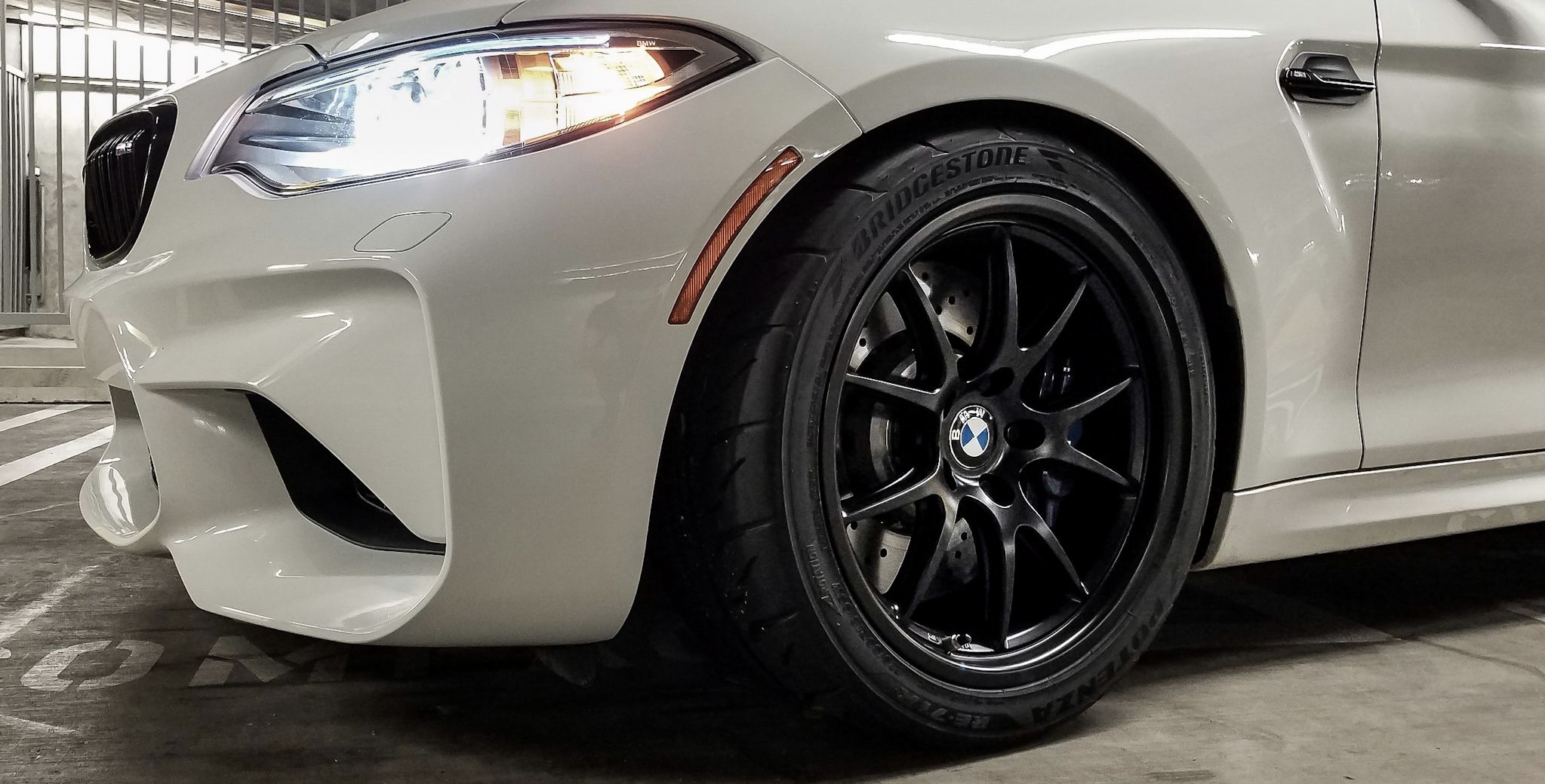 White BMW F87 M2 with 18" FL-5 Apex wheels in Satin Black
