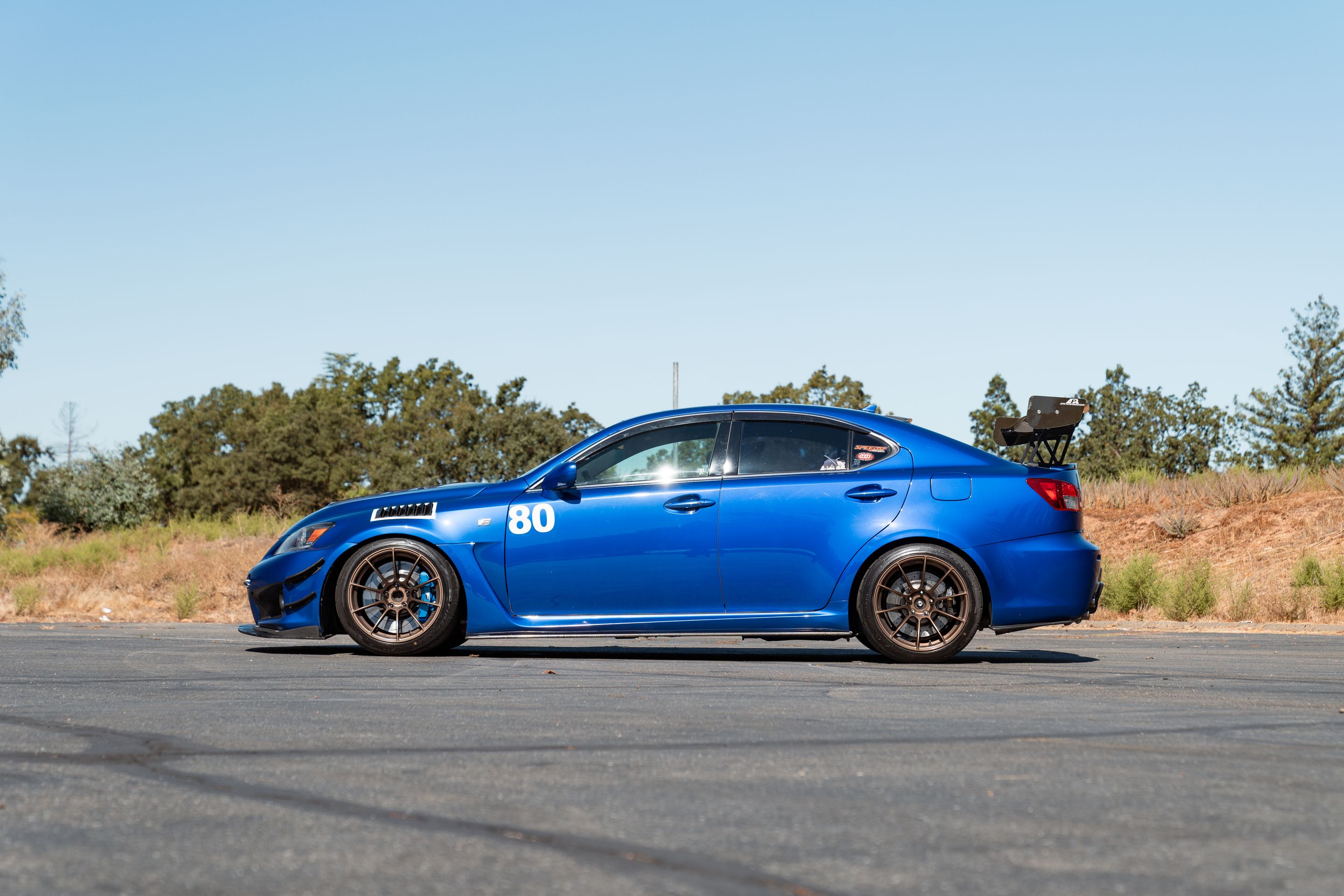 Blue Lexus USE20 IS-F with 18" SM-10RS Apex wheels in Satin Bronze