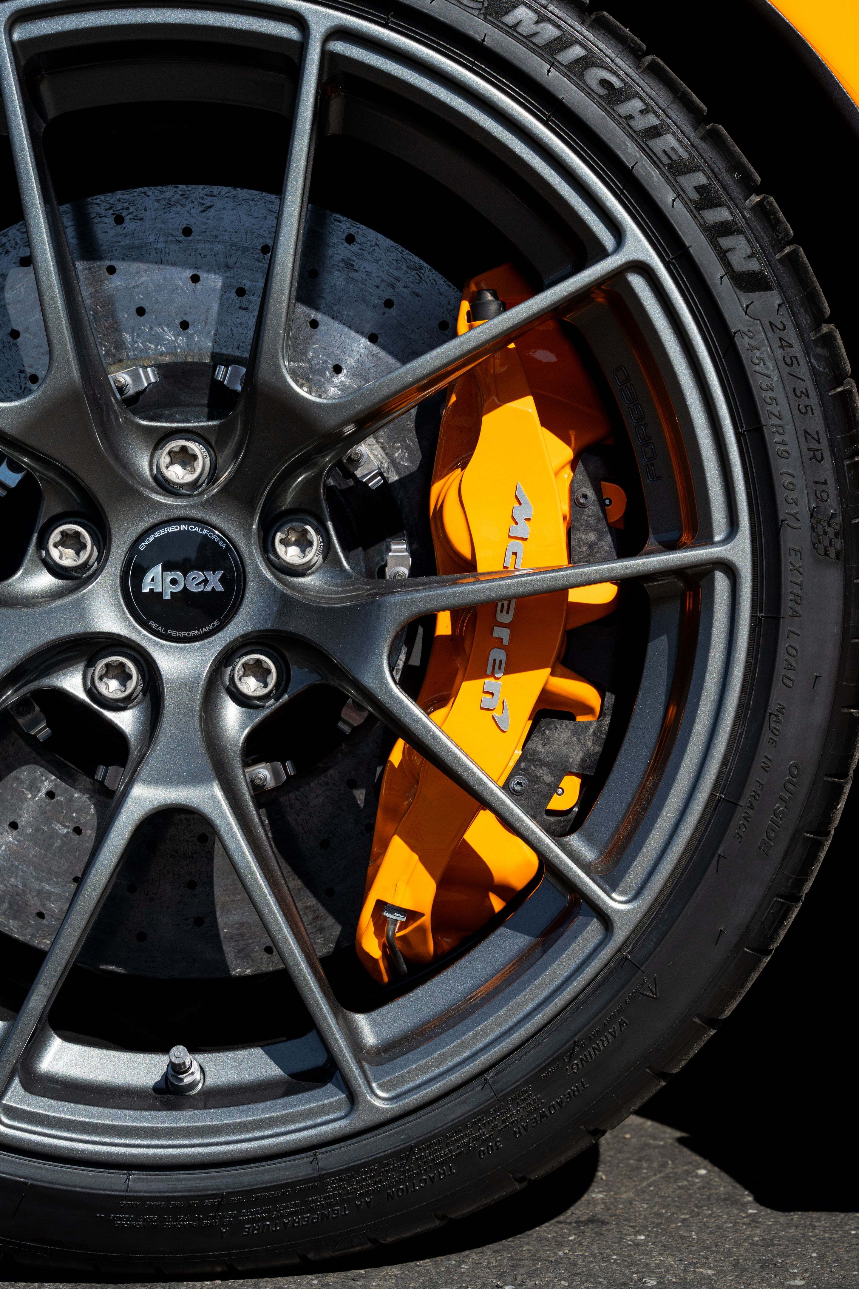 Orange McLaren 765LT with 19"/20" VS-5RS Apex wheels in Anthracite