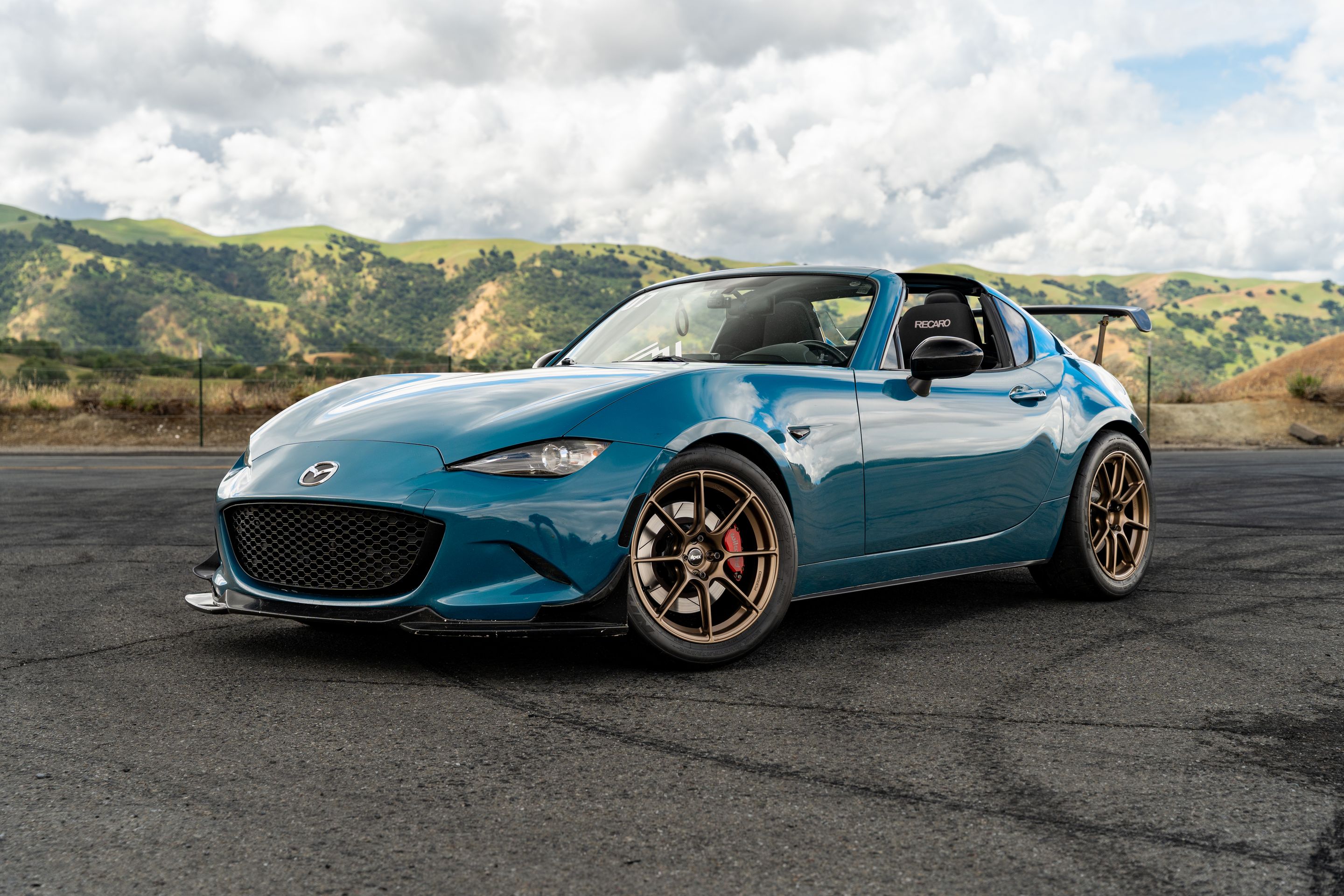 Blue Mazda ND MX-5 Miata with 17" SM-8RS Apex wheels in Satin Bronze