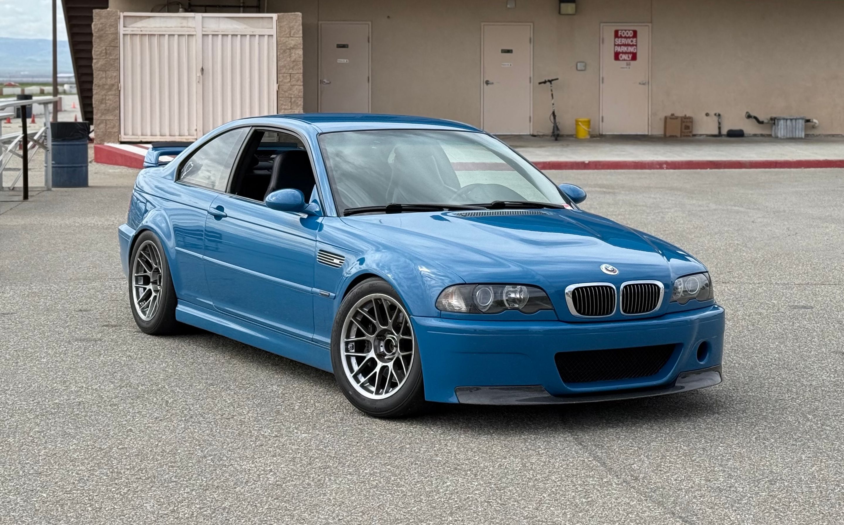 Blue BMW E46 M3 with 17" ARC-8 Apex wheels in Hyper Black