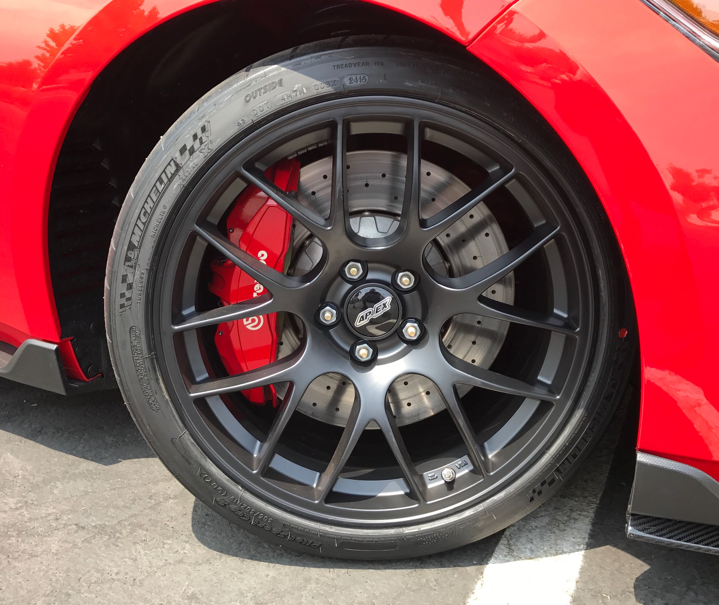 Red Ford S550 Mustang GT350 with 19" EC-7 Apex wheels in Satin Black