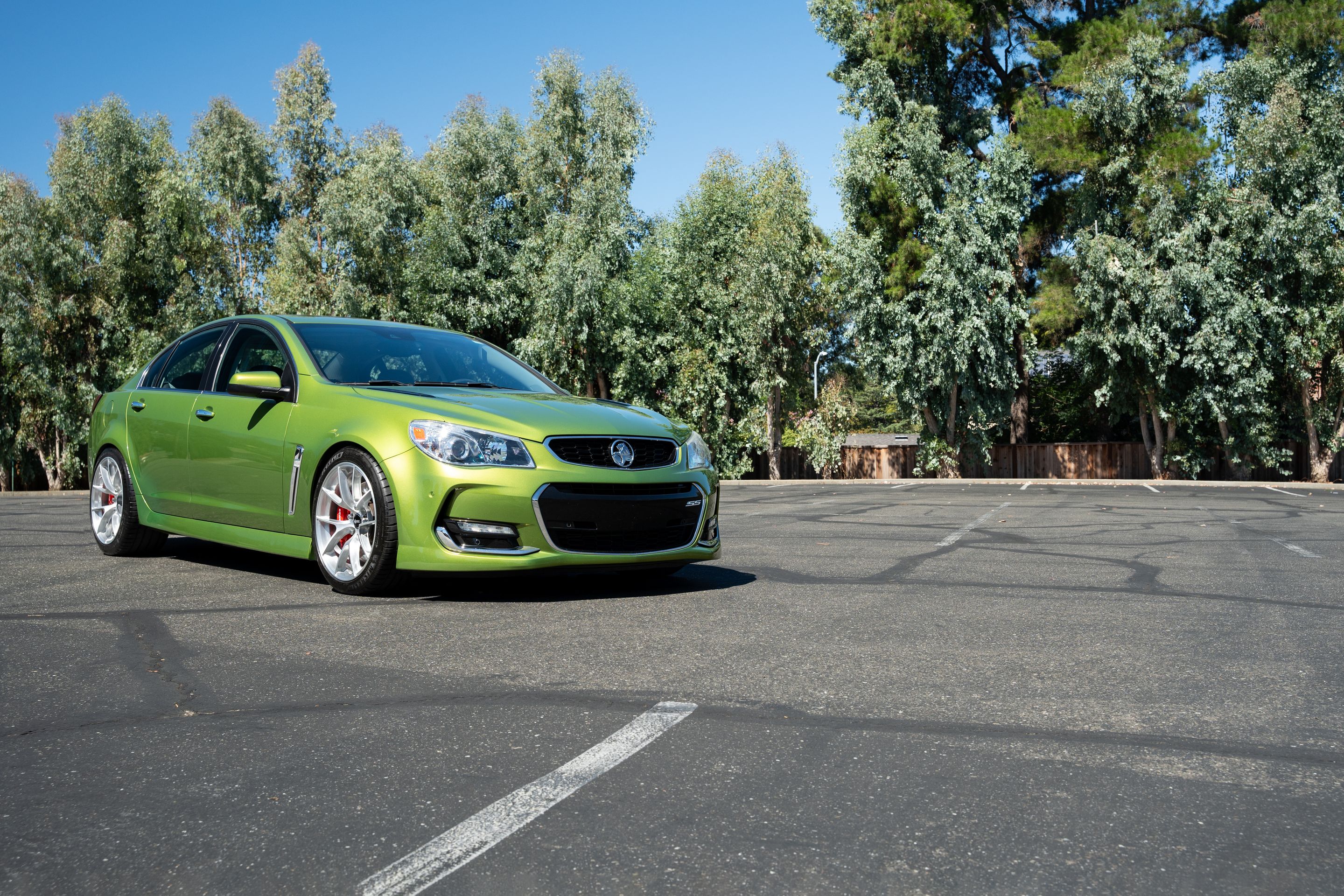 Green Chevrolet SS with 19" VS-5RS Apex wheels in Brushed Clear