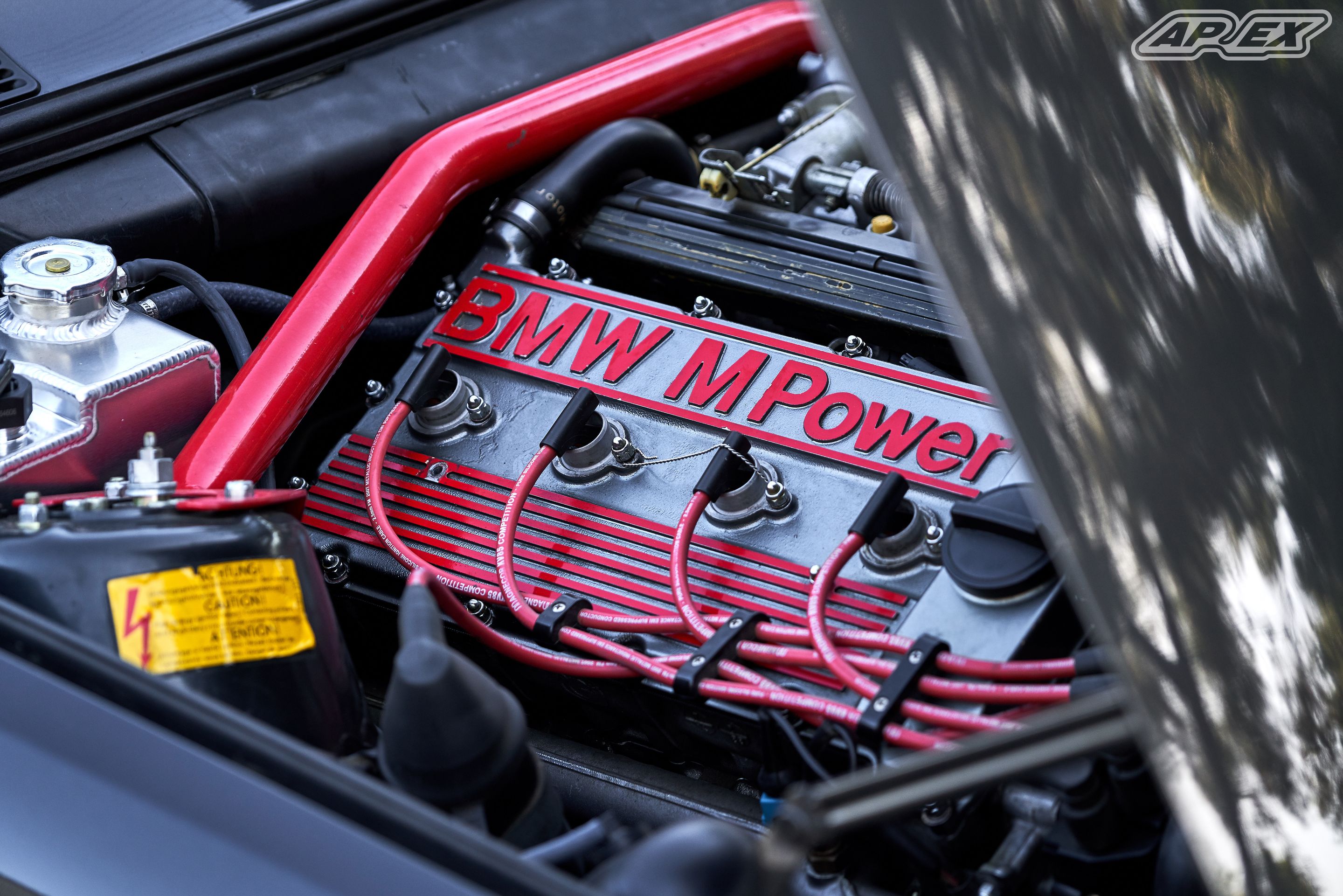 Black BMW E30 M3 with 17" ARC-8 Apex wheels in Hyper Silver