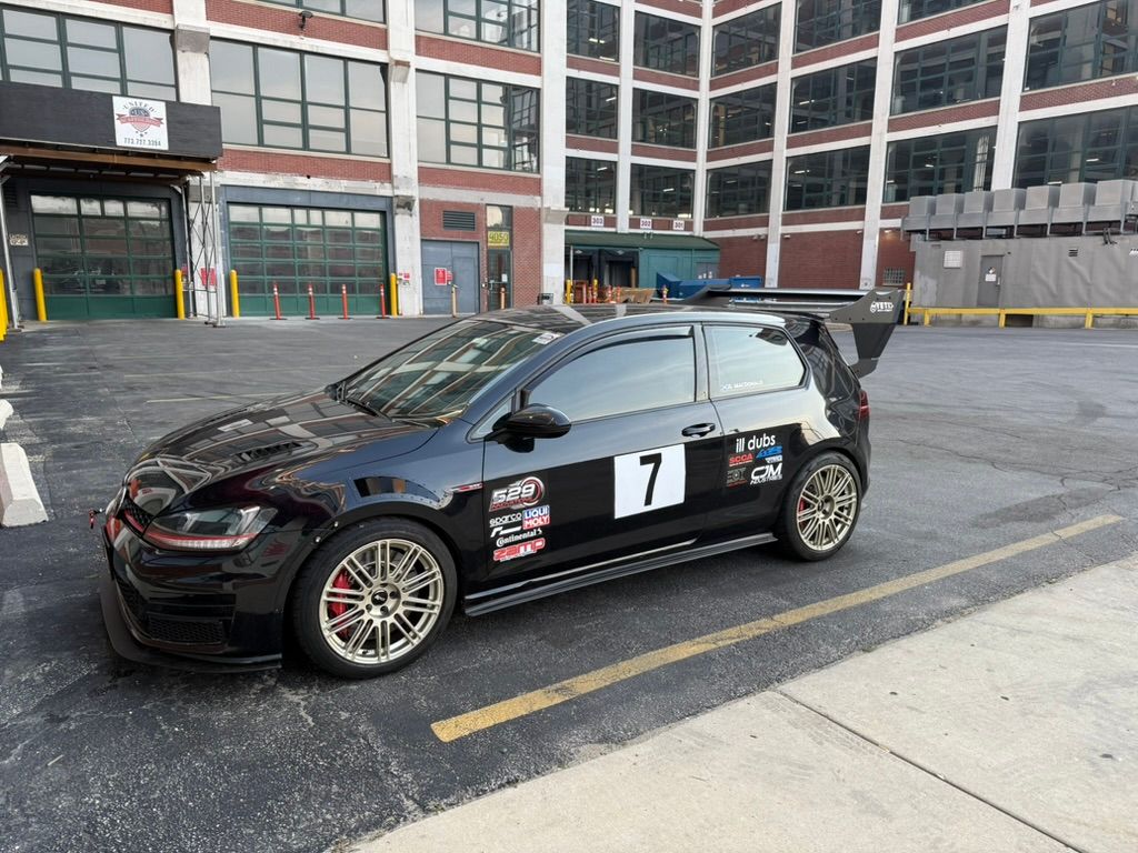 Black VW MK7 GTI with 18" TC-10RT Apex wheels in Motorsport Gold