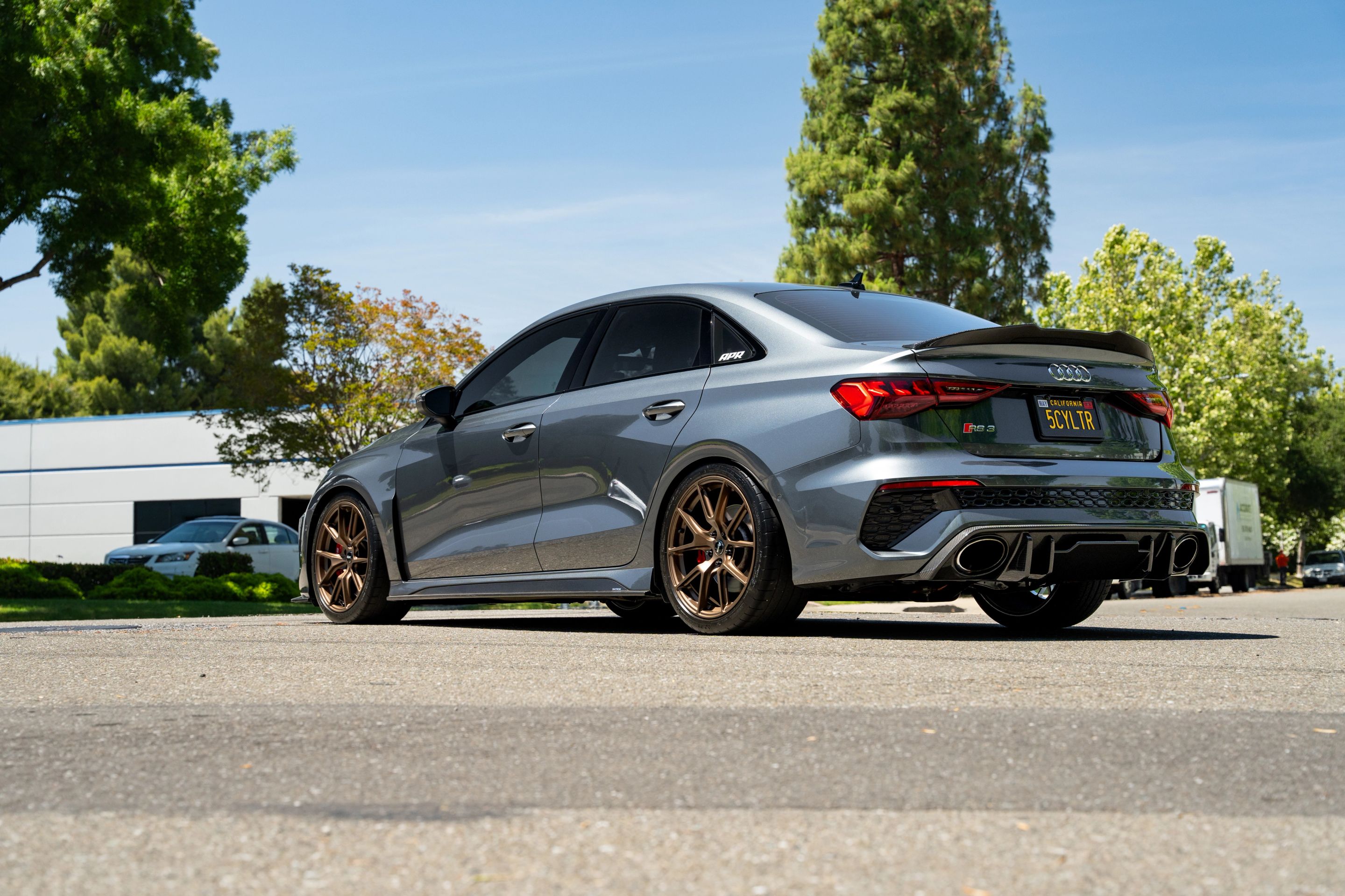 Grey Audi 8Y RS 3 with 18" VS-5 Apex wheels in Satin Bronze