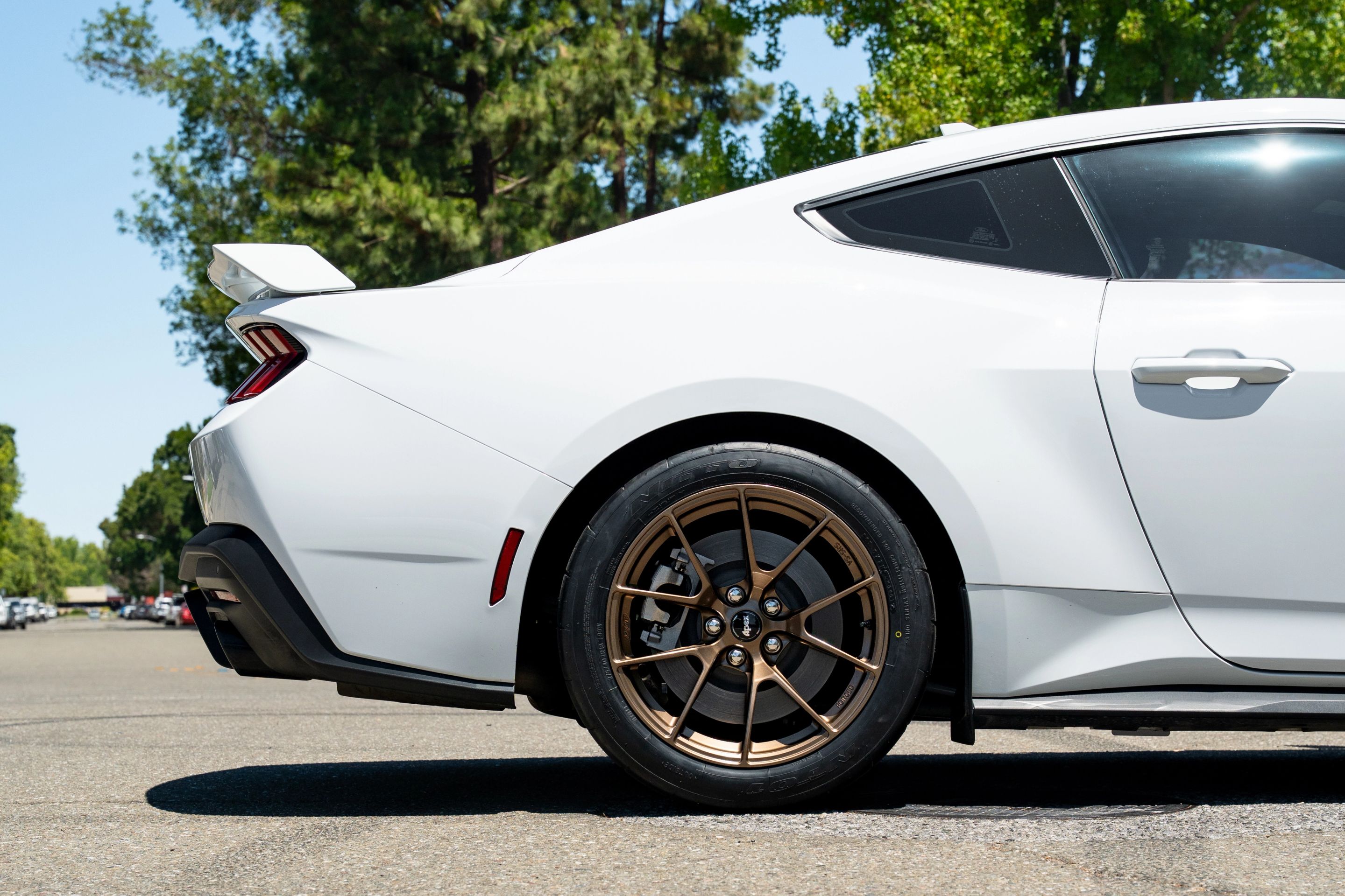 White Ford S650 Mustang GT with 18" VS-5RS Apex wheels in Satin Bronze