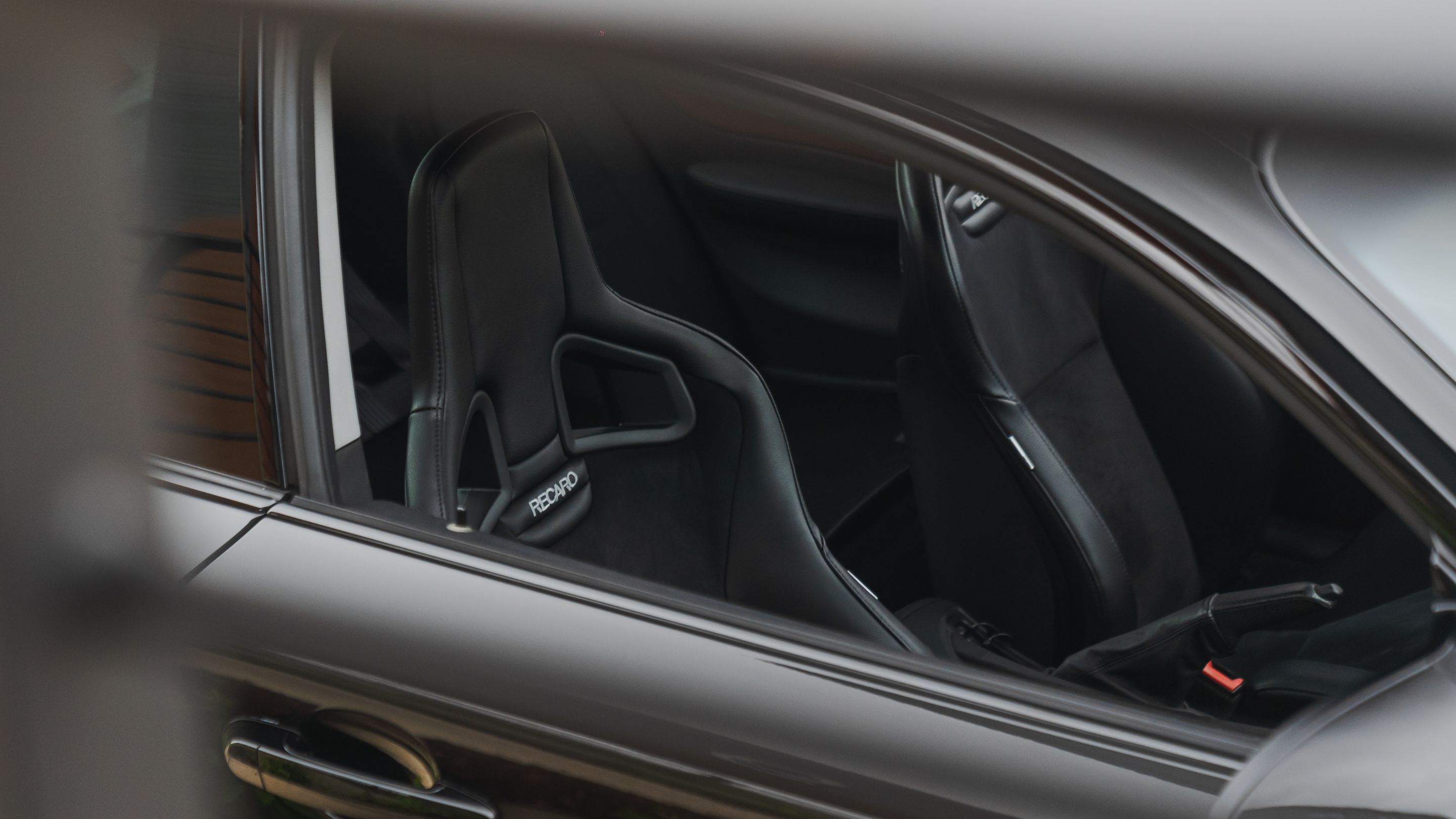 Black BMW E82 Coupe 1 Series with 18" VS-5RS Apex wheels in Motorsport Gold