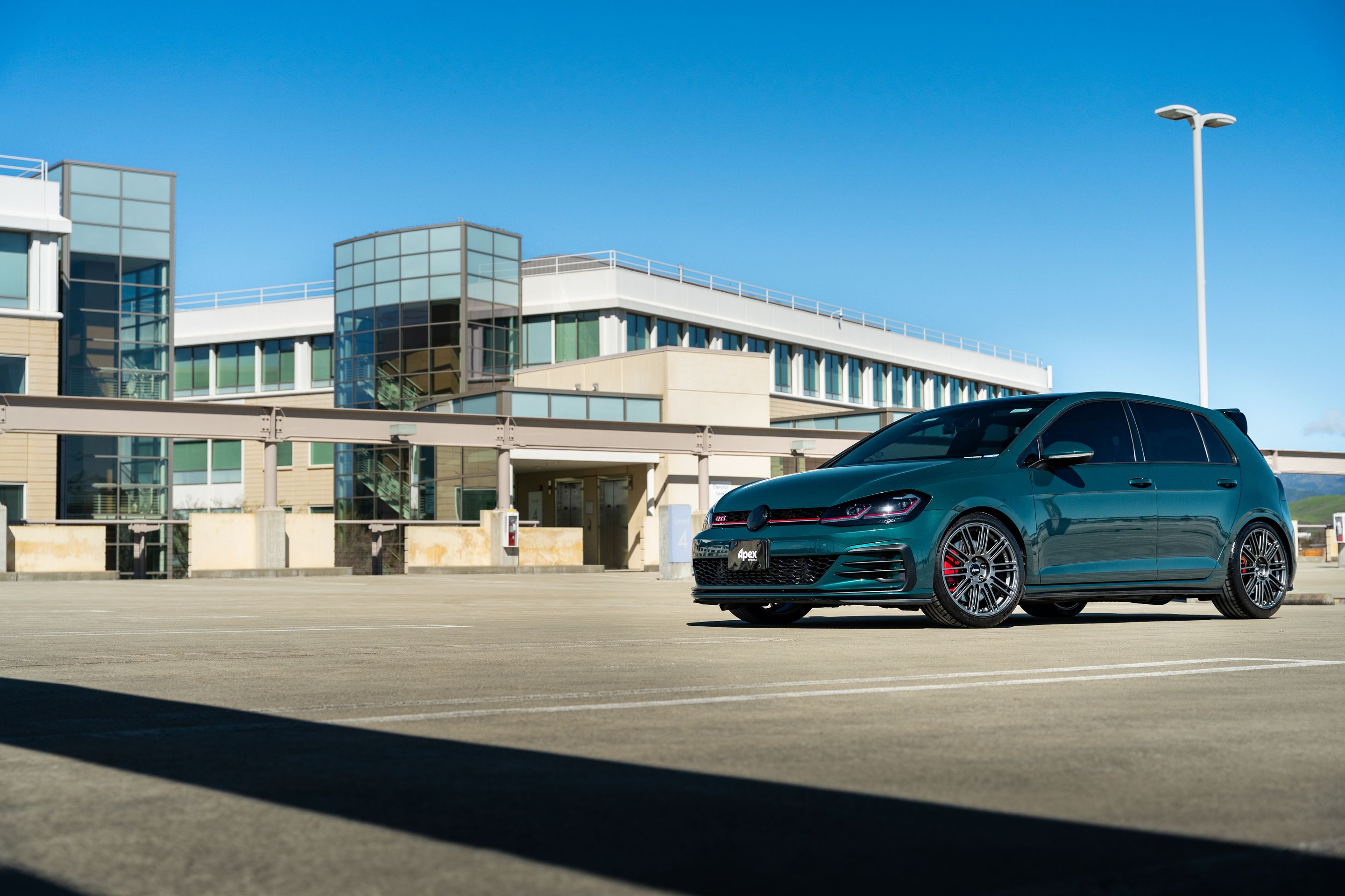 Green VW MK7 GTI with 18" TC-10RT Apex wheels in Anthracite