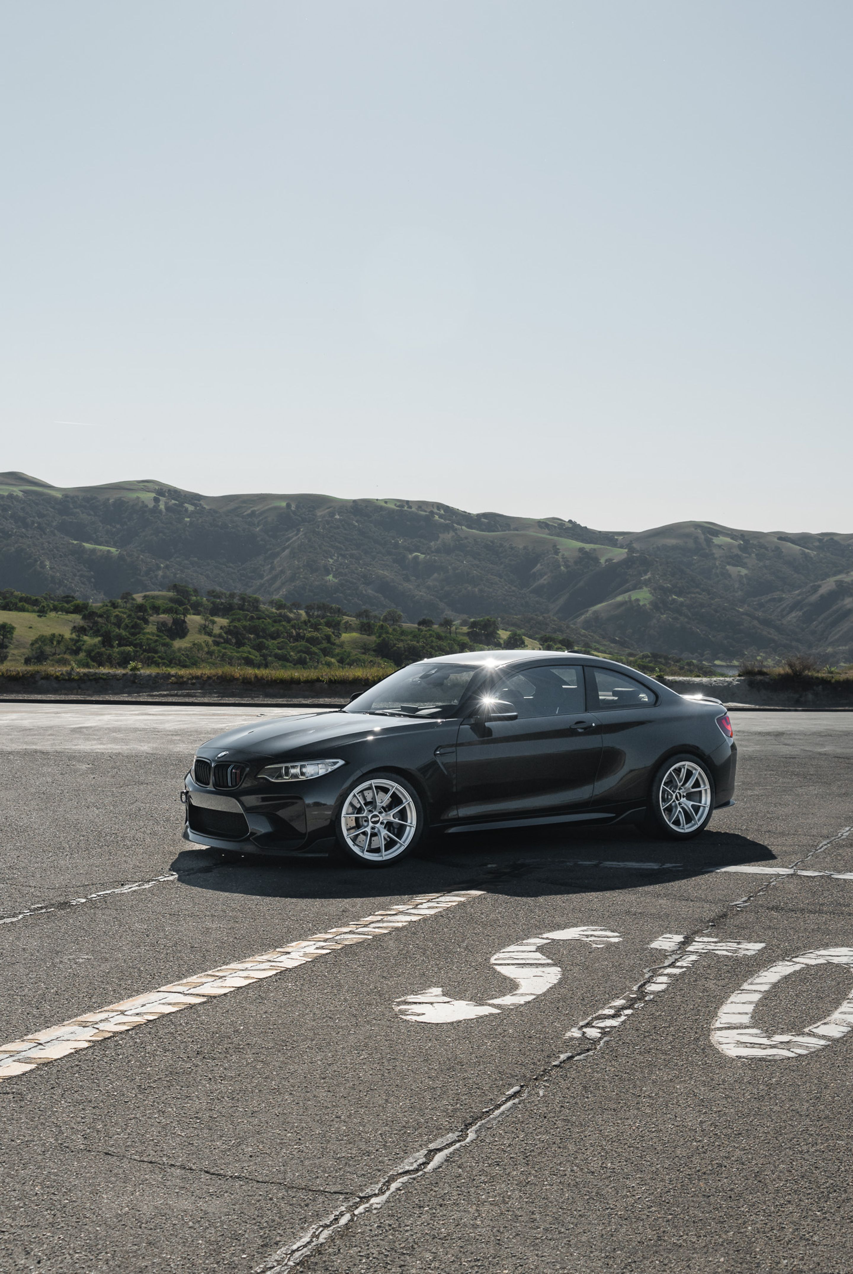 Black BMW F87 M2 with 19" VS-5RS Apex wheels in Brushed Clear