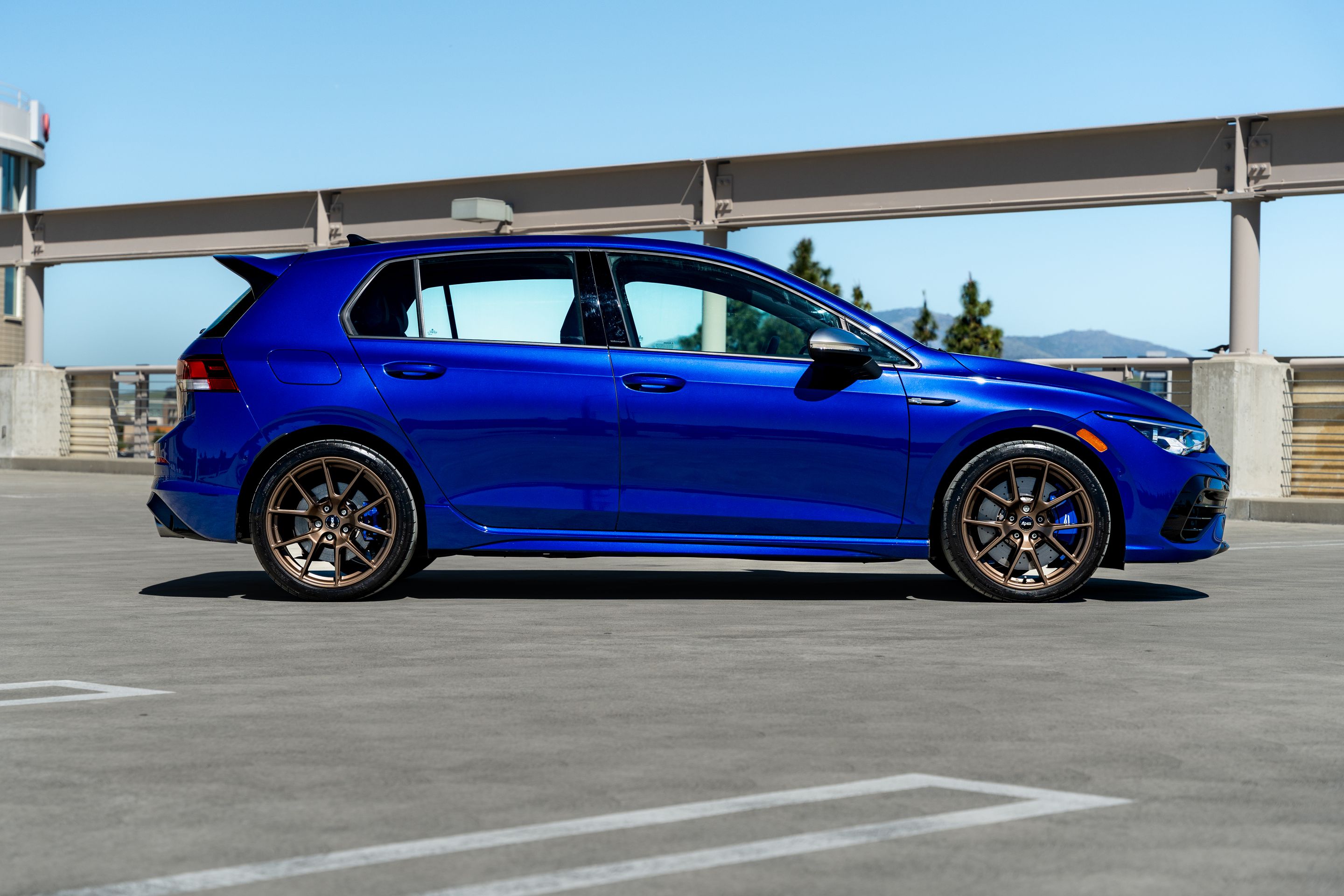 Blue VW MK8 Golf R with 18" VS-5 Apex wheels in Satin Bronze