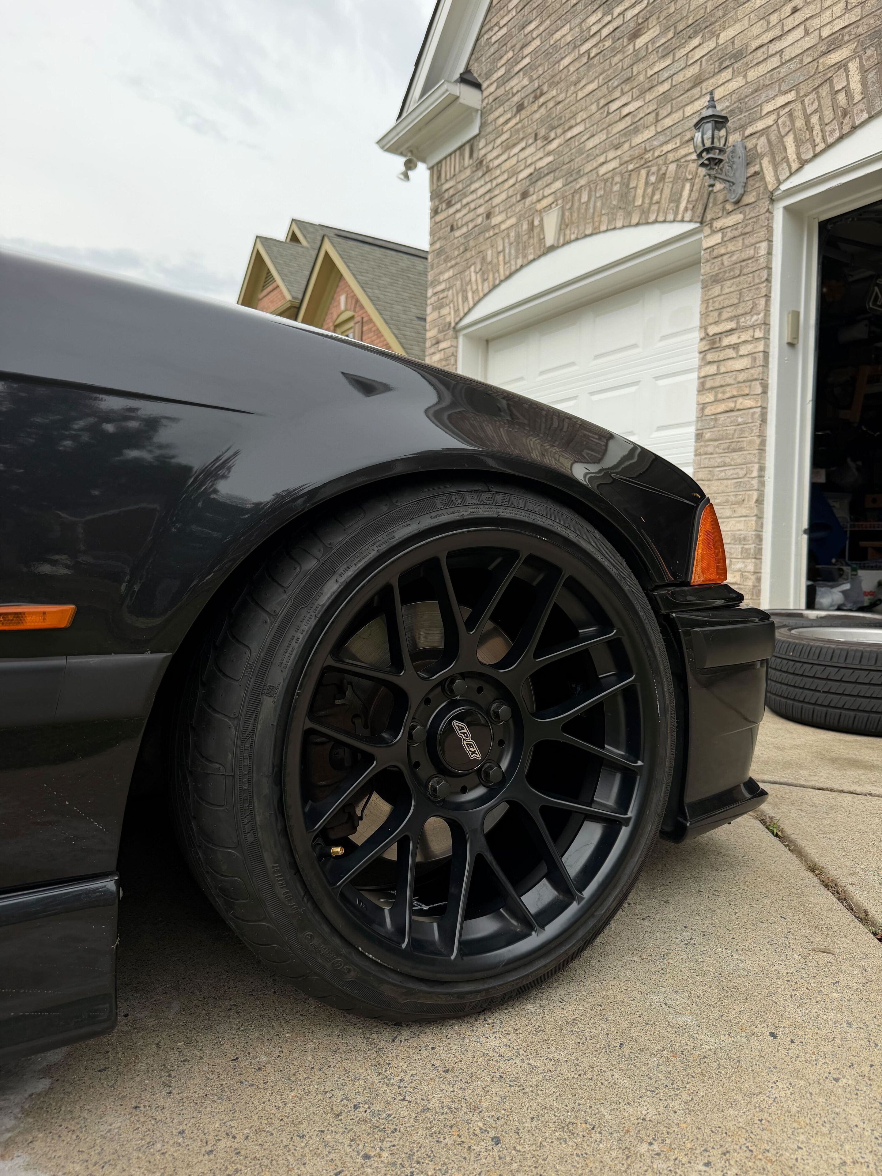 Black BMW E36 M3 with 17" ARC-8 Apex wheels in Satin Black
