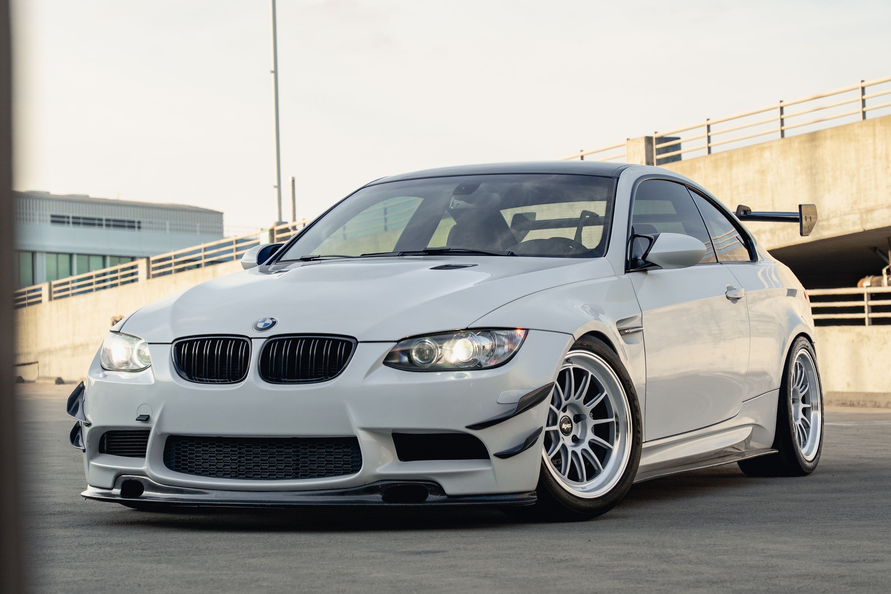 White BMW E92 Coupe M3 with 18" SL-12 Apex wheels in Machined Lip Race Silver