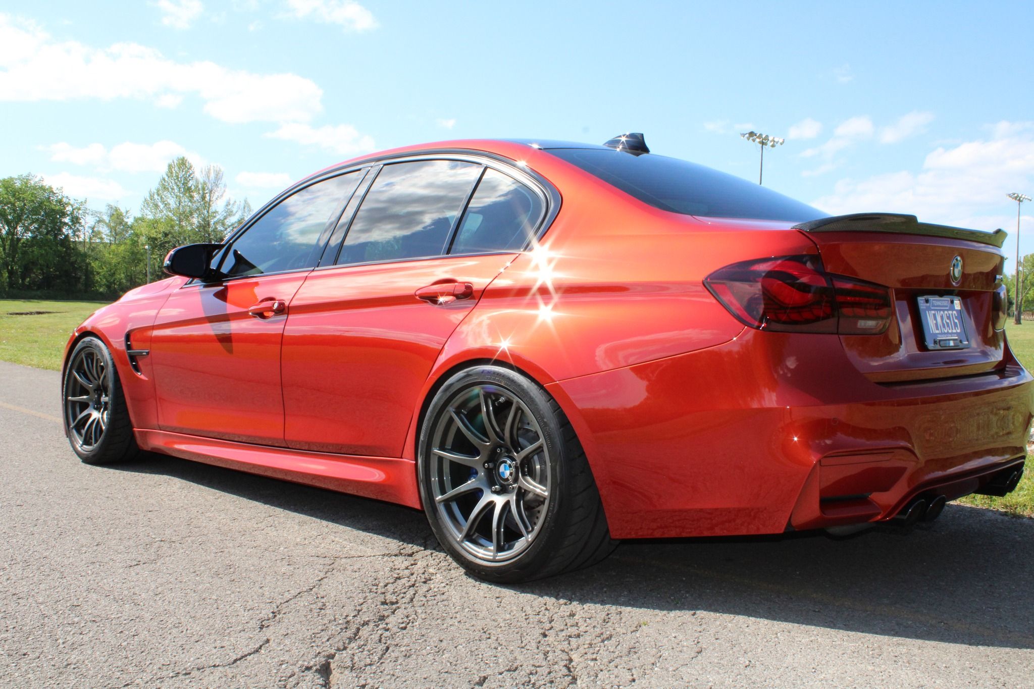 Orange BMW F80 M3 with 18" SM-10 Apex wheels in Anthracite