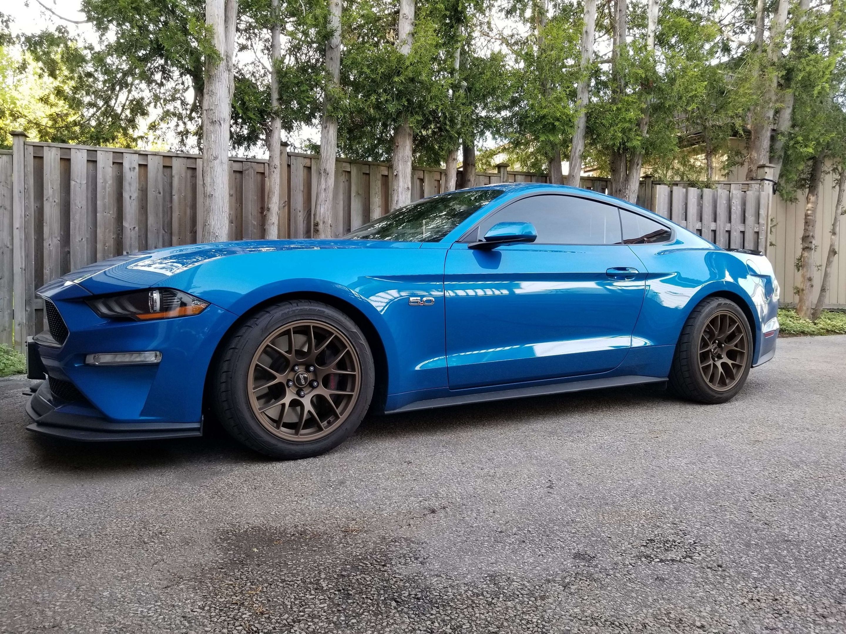 Blue Ford S550 Mustang GT with 18" EC-7 Apex wheels in Satin Bronze