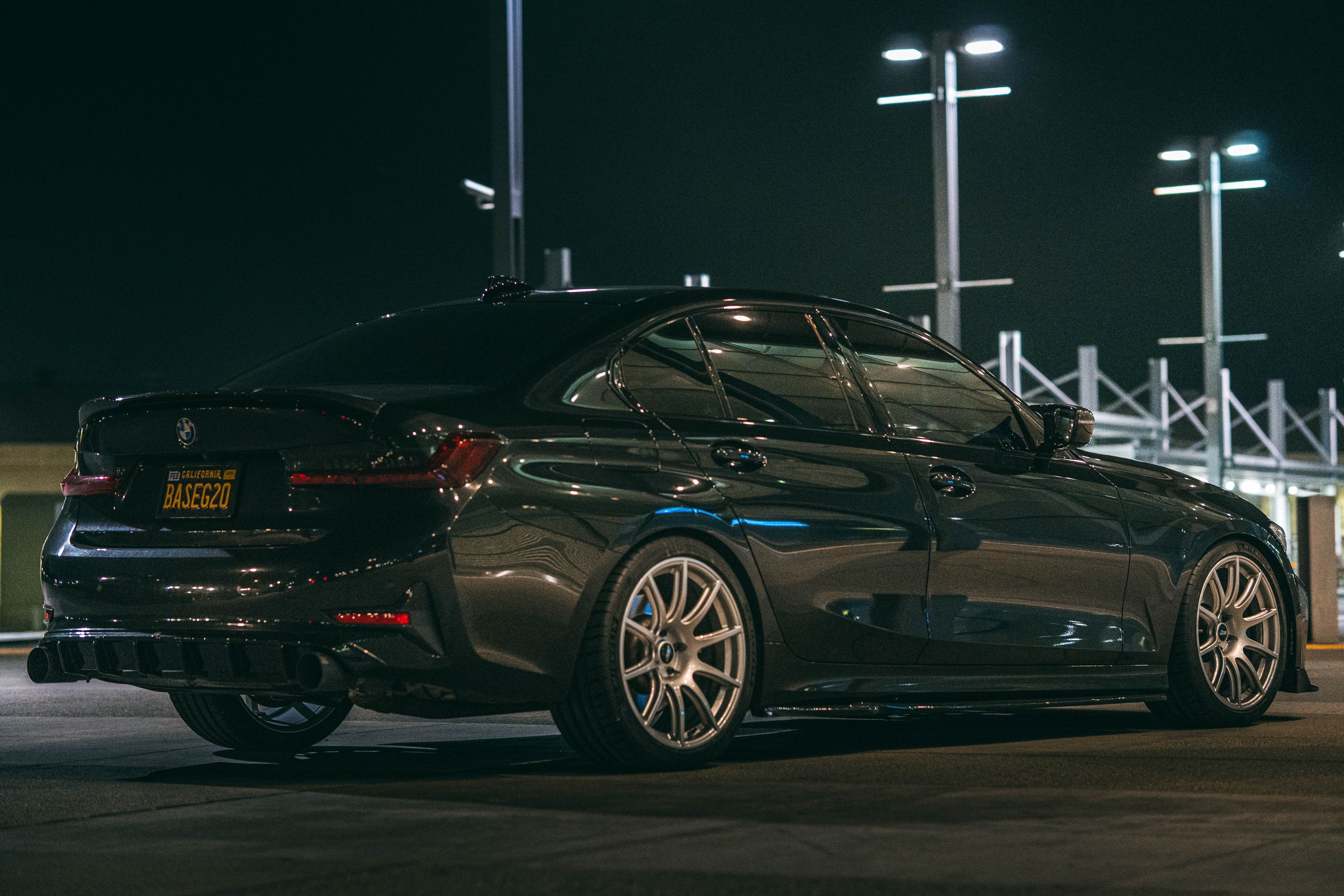 Black BMW G20 Sedan 3 Series with 19" SM-10 Apex wheels in Race Silver