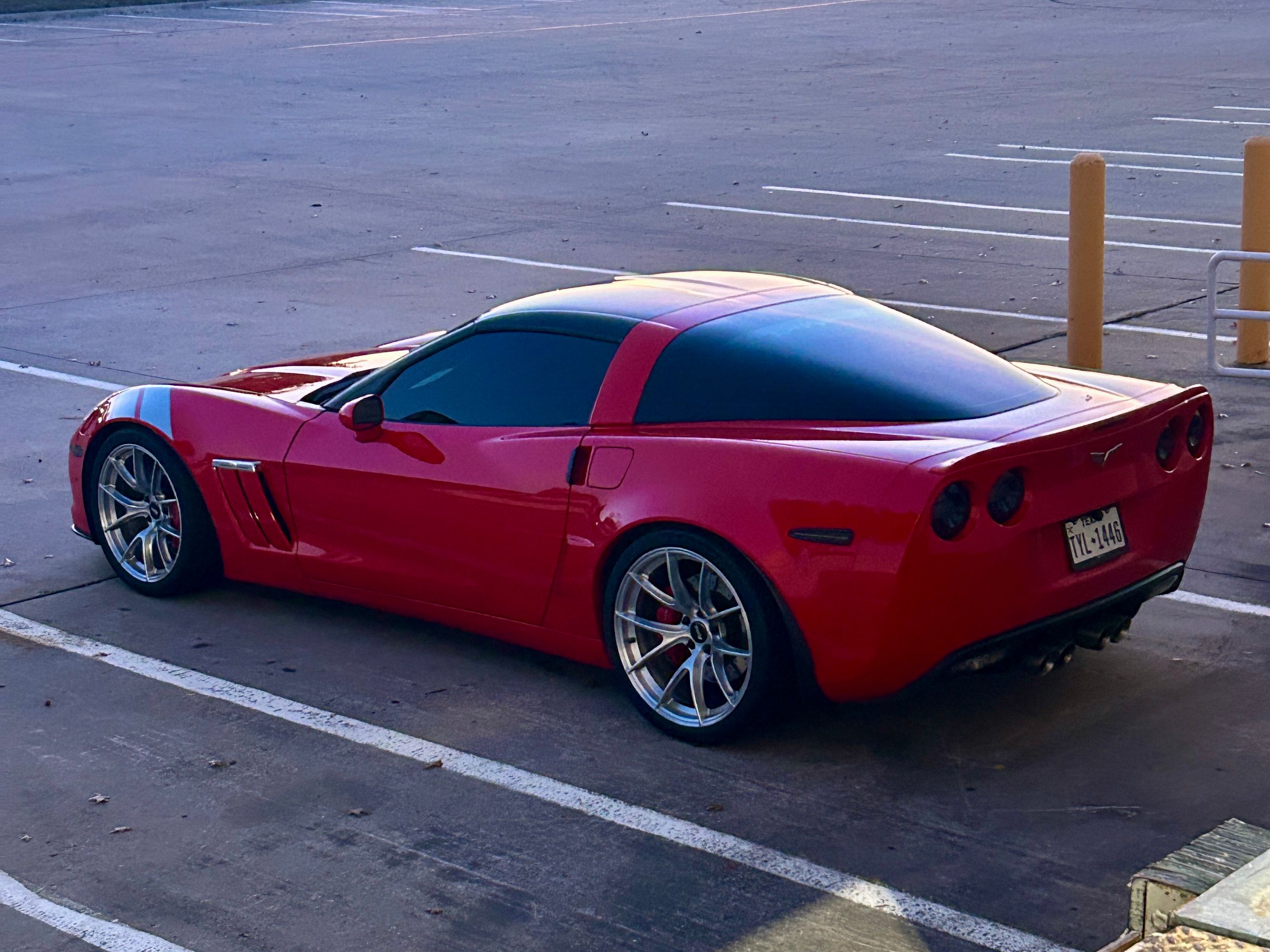 Red Chevrolet C6 Corvette Grand Sport with 19"/20" VS-5RS Apex wheels in Brushed Clear