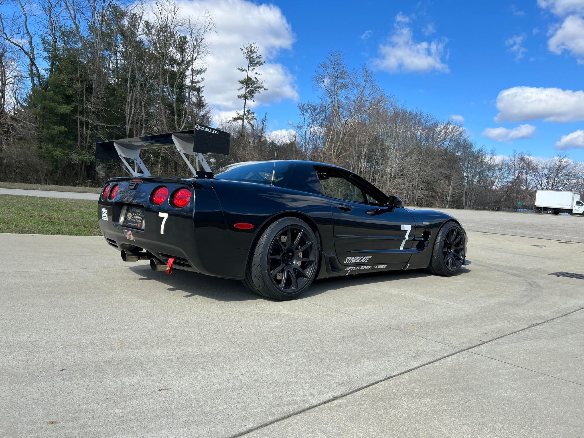 Black Chevrolet C5 Corvette Z06 with 19" SM-10 Apex wheels in Satin Black