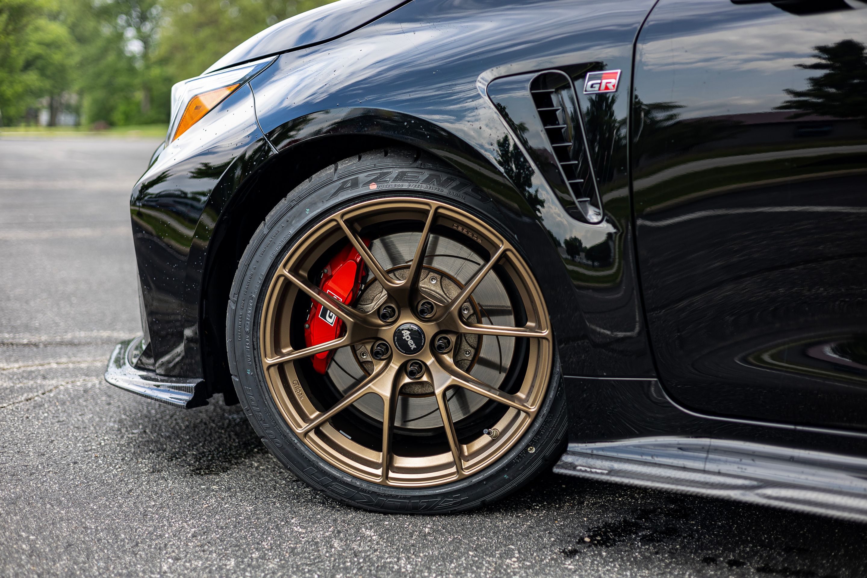 Black Toyota GR Corolla with 18" VS-5RS Apex wheels in Satin Bronze