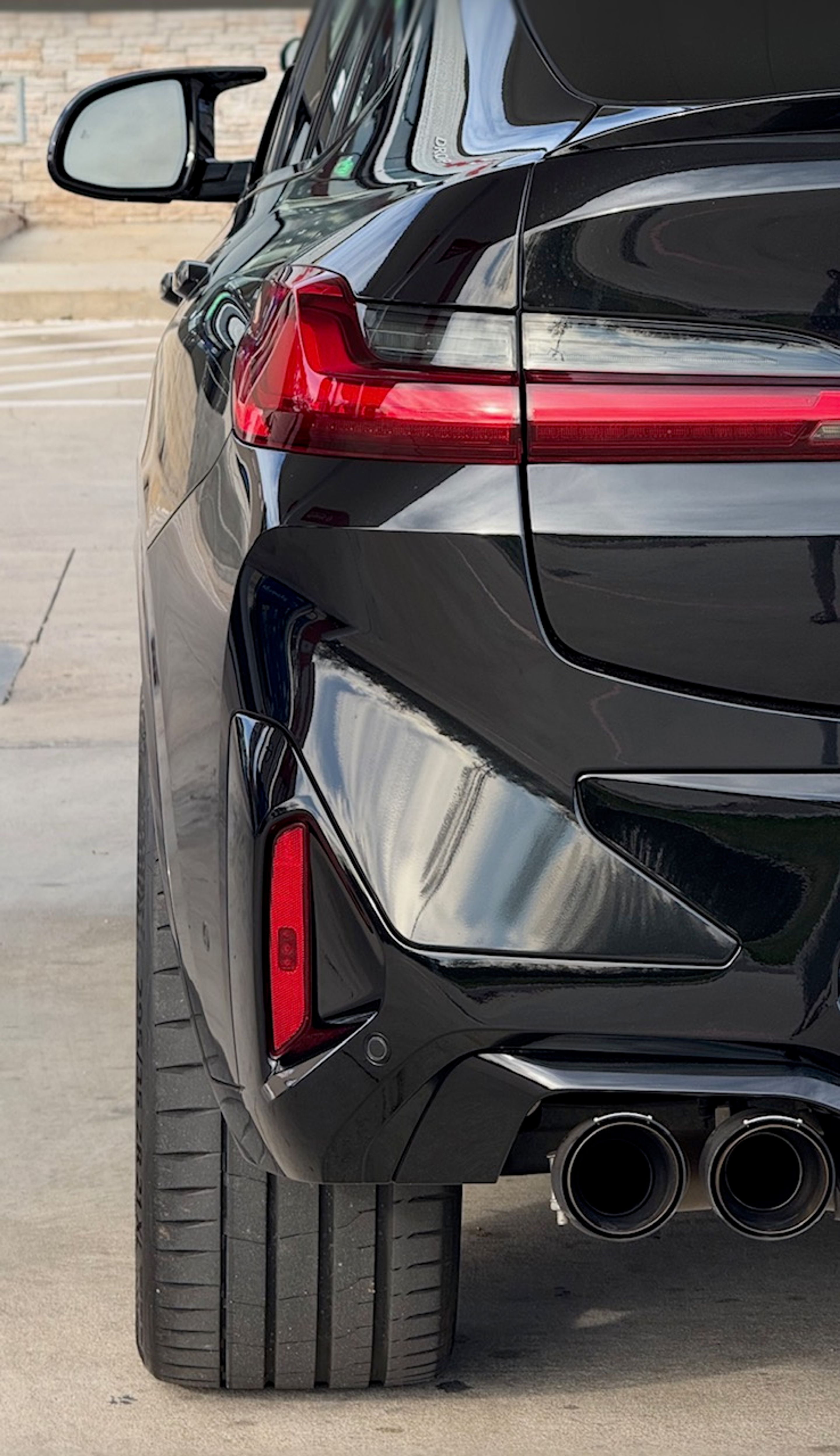 Black BMW F98 X4M with 21" VS-5RX Apex wheels in Satin Black