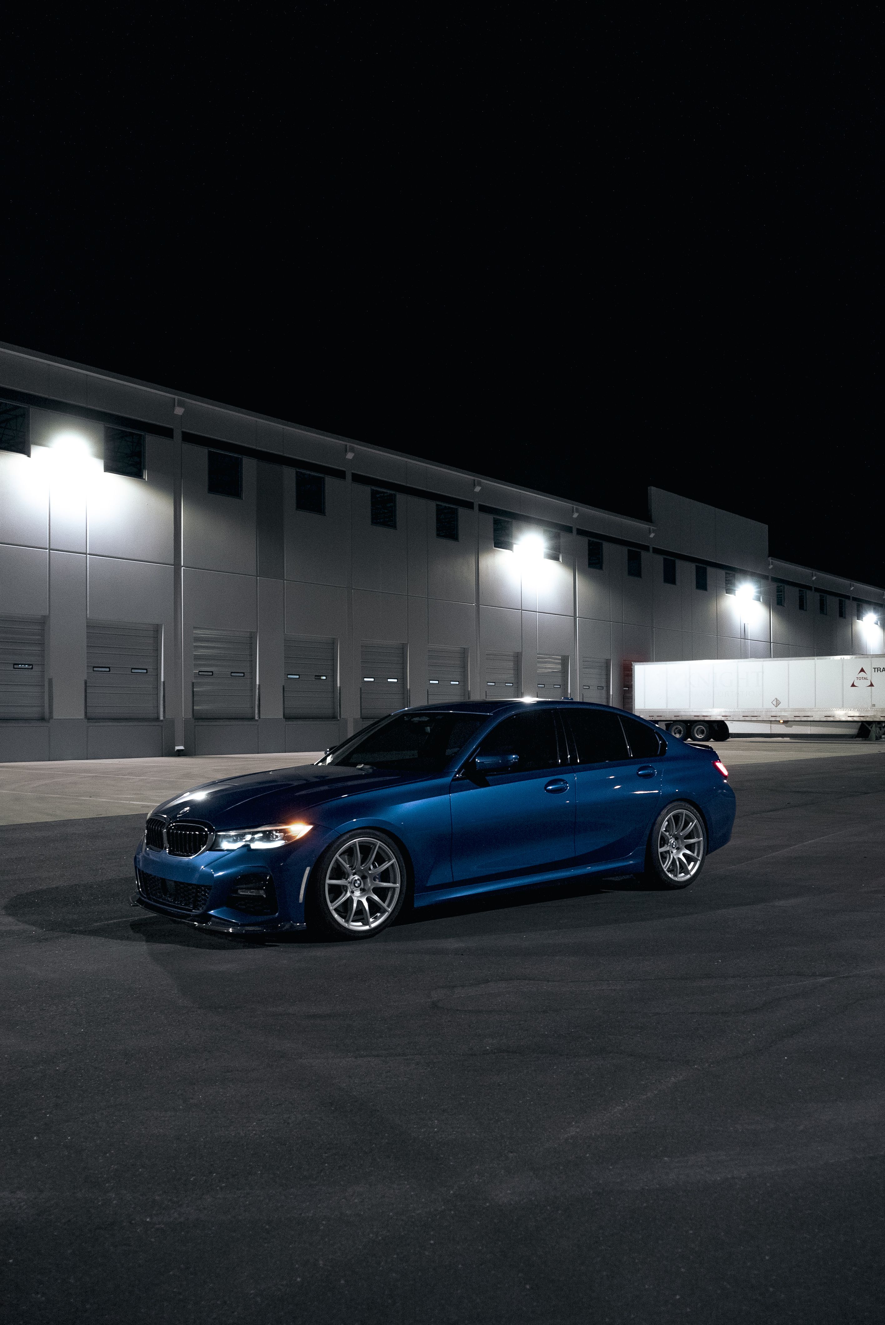 Blue BMW G20 Sedan 3 Series with 19" SM-10 Apex wheels in Race Silver