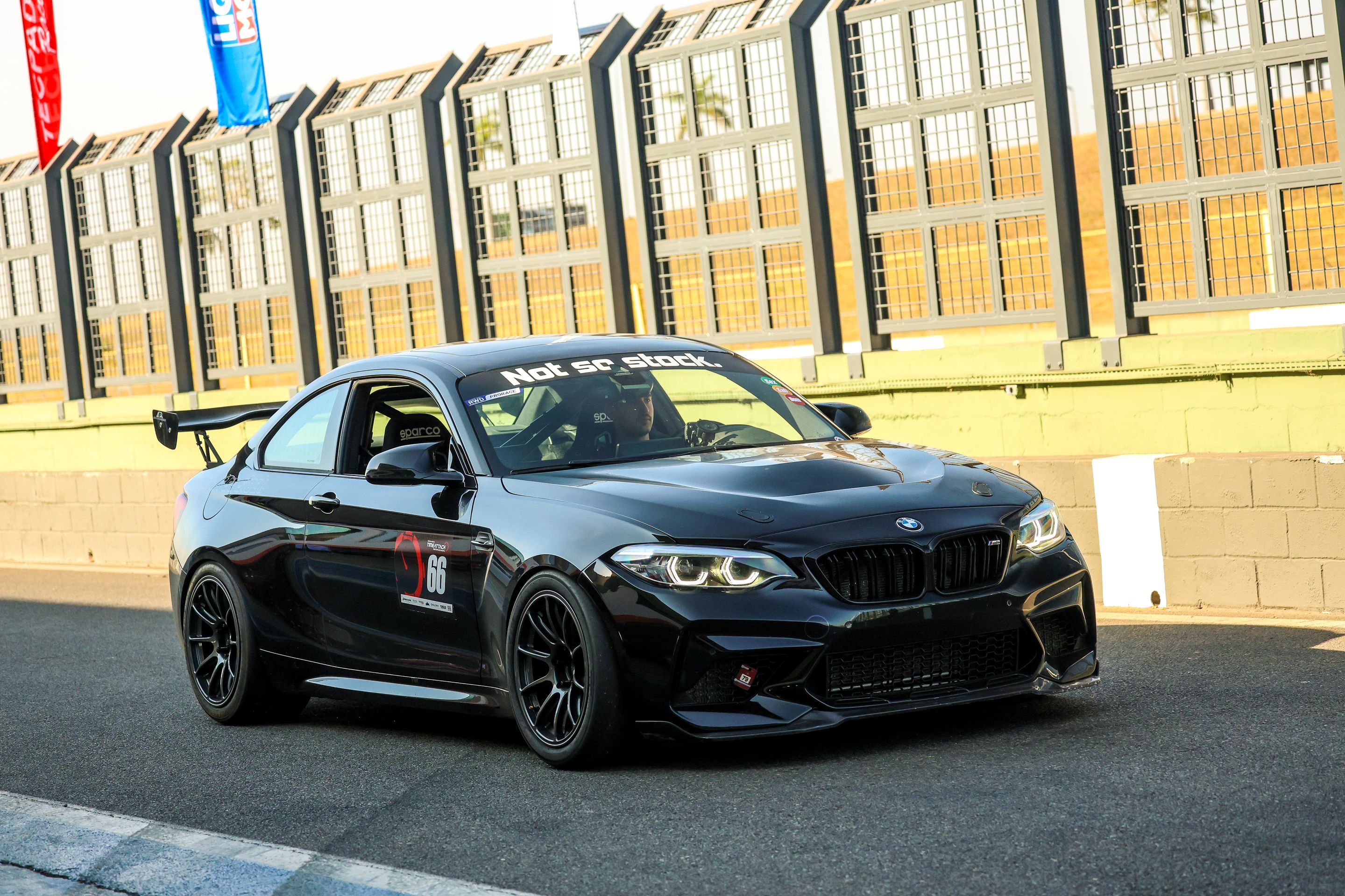 Black BMW F87 M2 with 18" SM-10RE Apex wheels in Anthracite