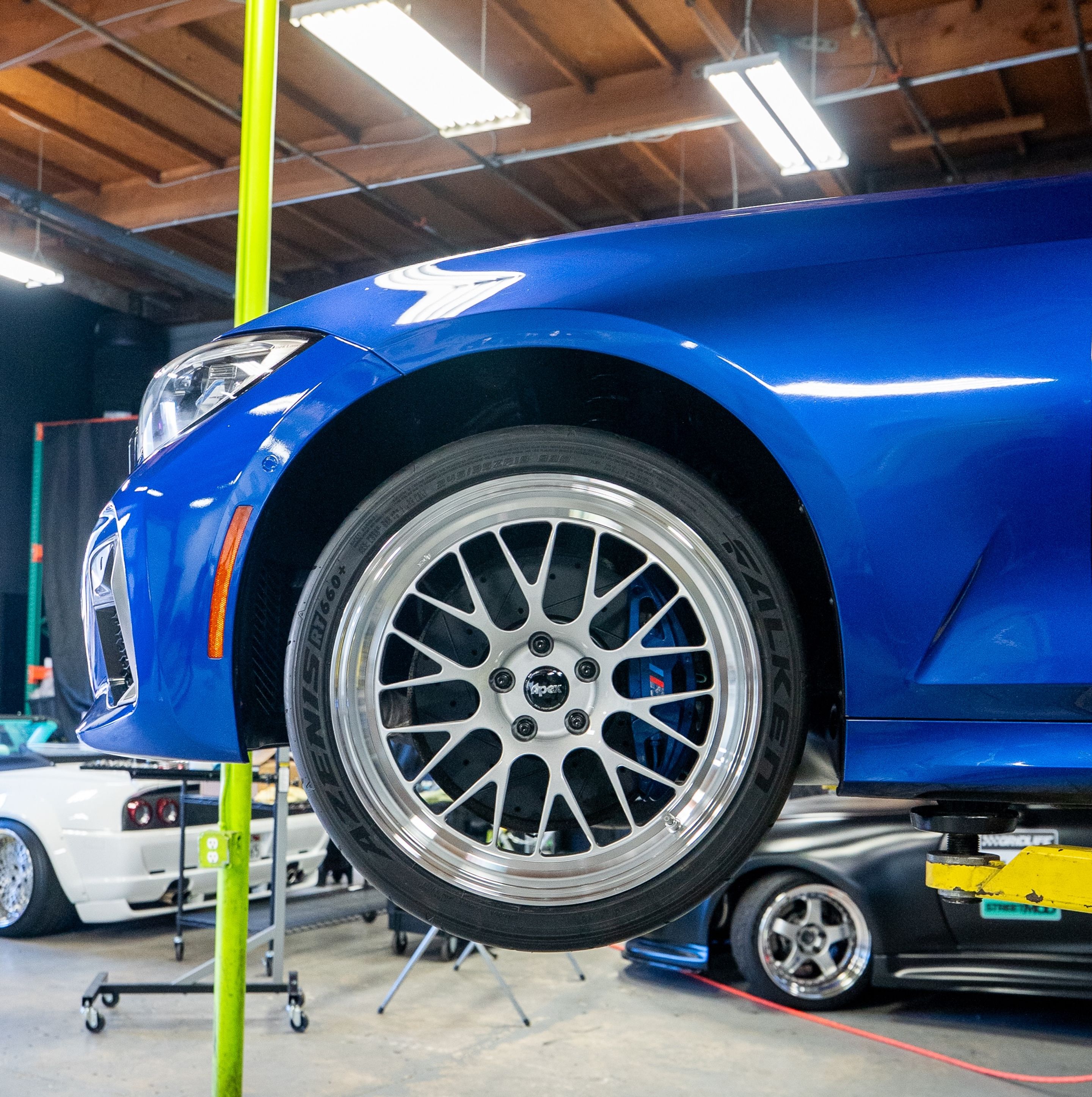 Blue BMW G20 Sedan 3 Series with 19" ML-10RT Apex wheels in Machined Lip Race Silver