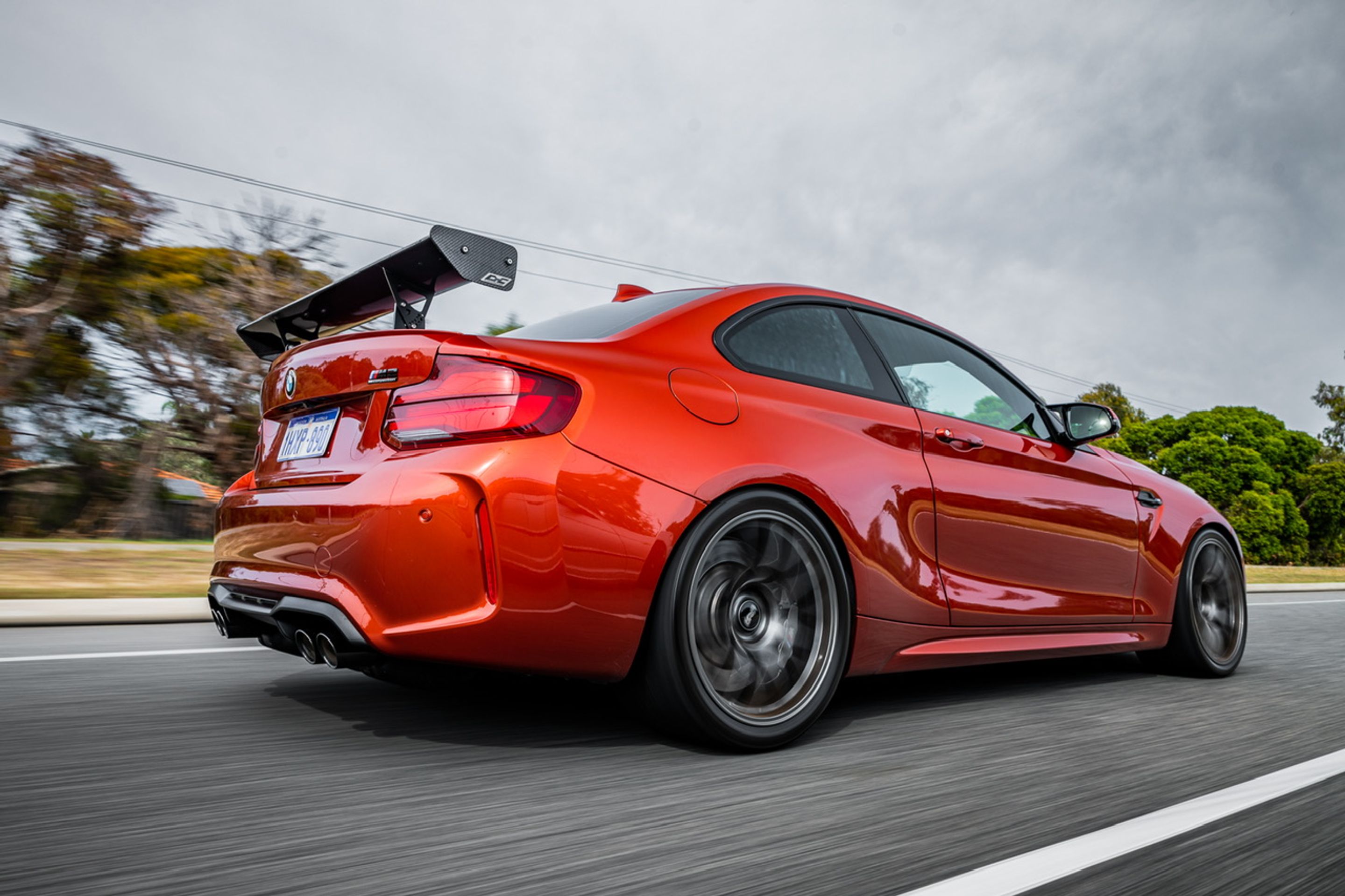 Orange BMW F87 M2 with 19" EC-7 Apex wheels in Anthracite