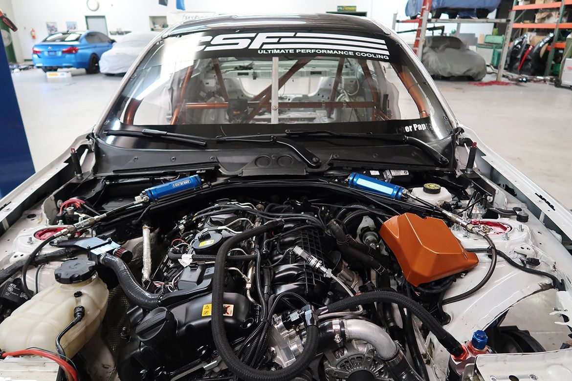 White BMW F87 M2 with 18" FL-5 Apex wheels in Anthracite