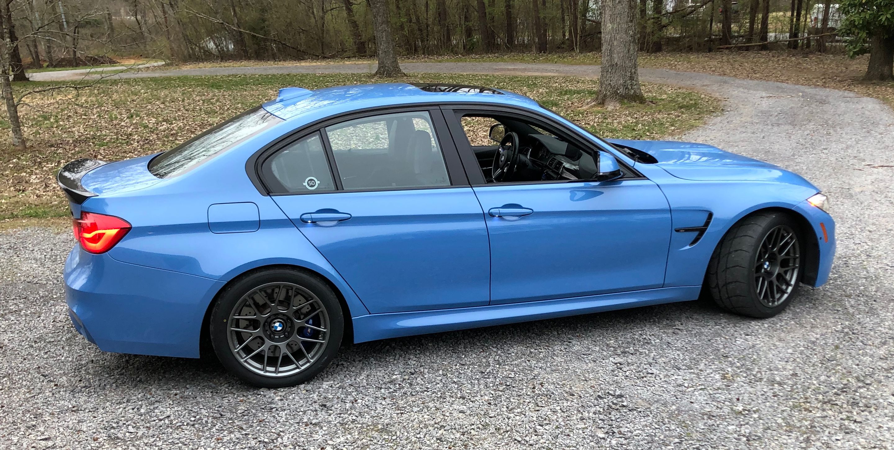 Blue BMW F80 M3 with 18" ARC-8R Apex wheels in Anthracite