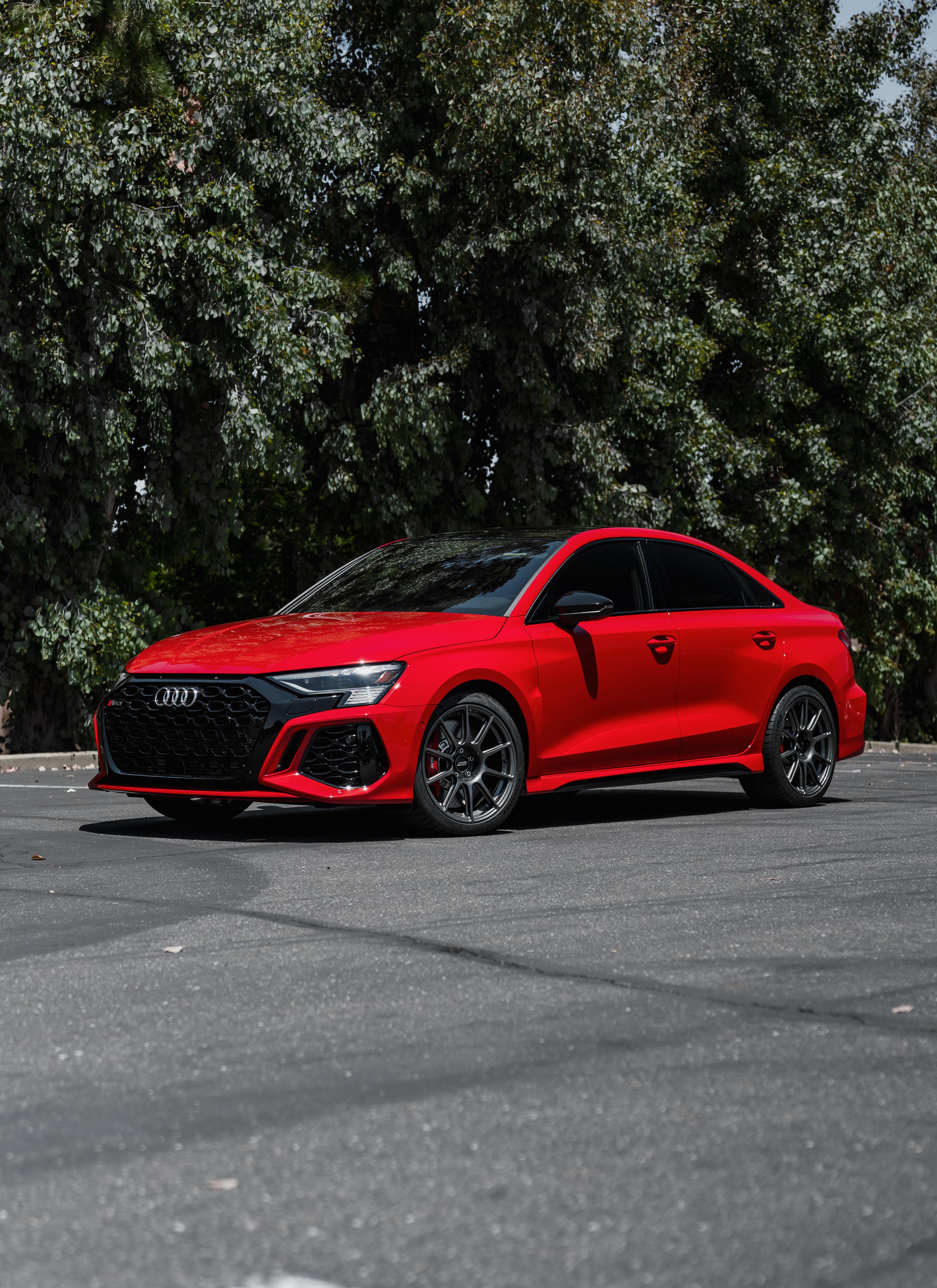 Red Audi 8Y RS 3 with 18" SM-10 Apex wheels in Anthracite
