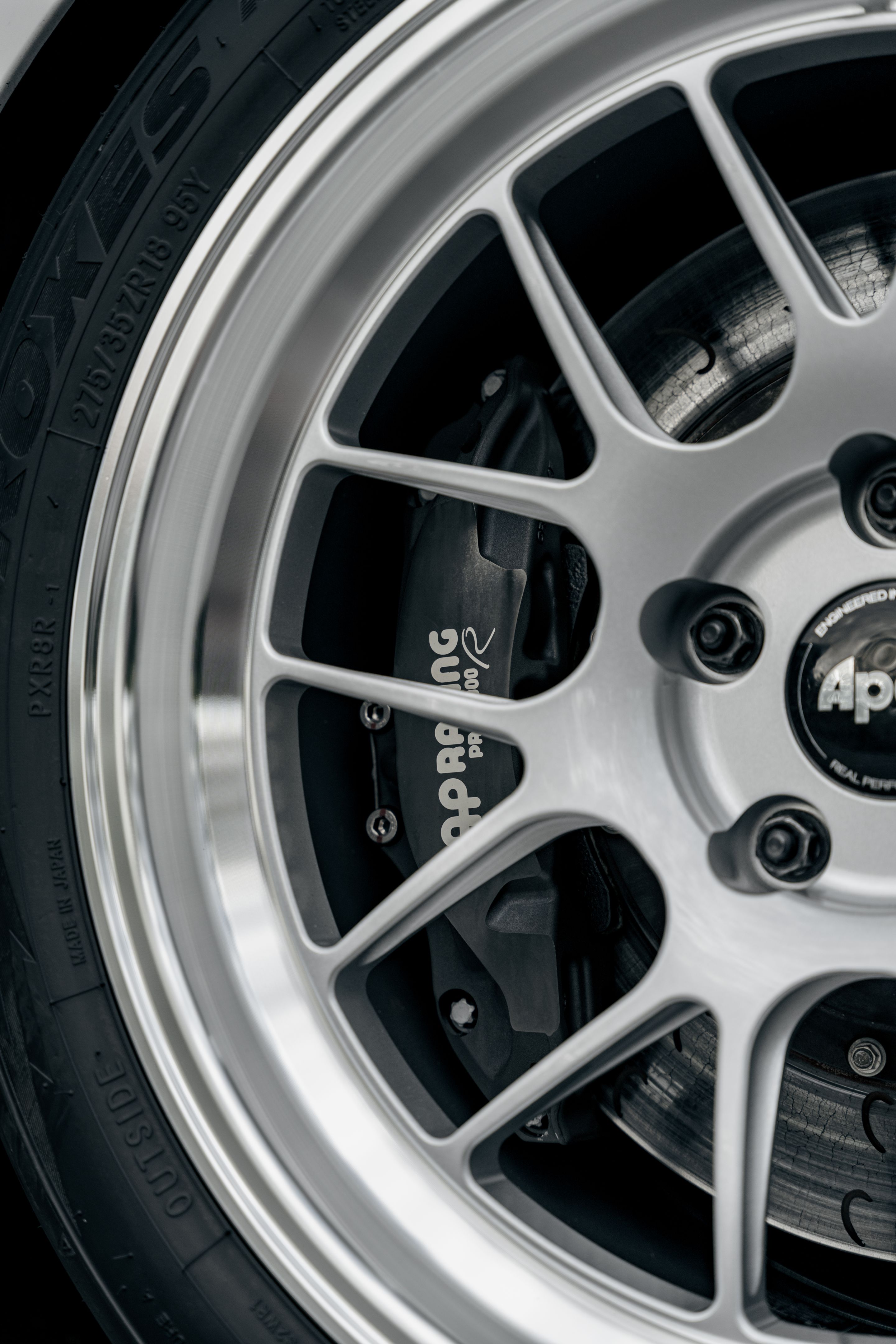 White BMW E92 Coupe M3 with 18" ML-7RT Apex wheels in Machined Lip Race Silver