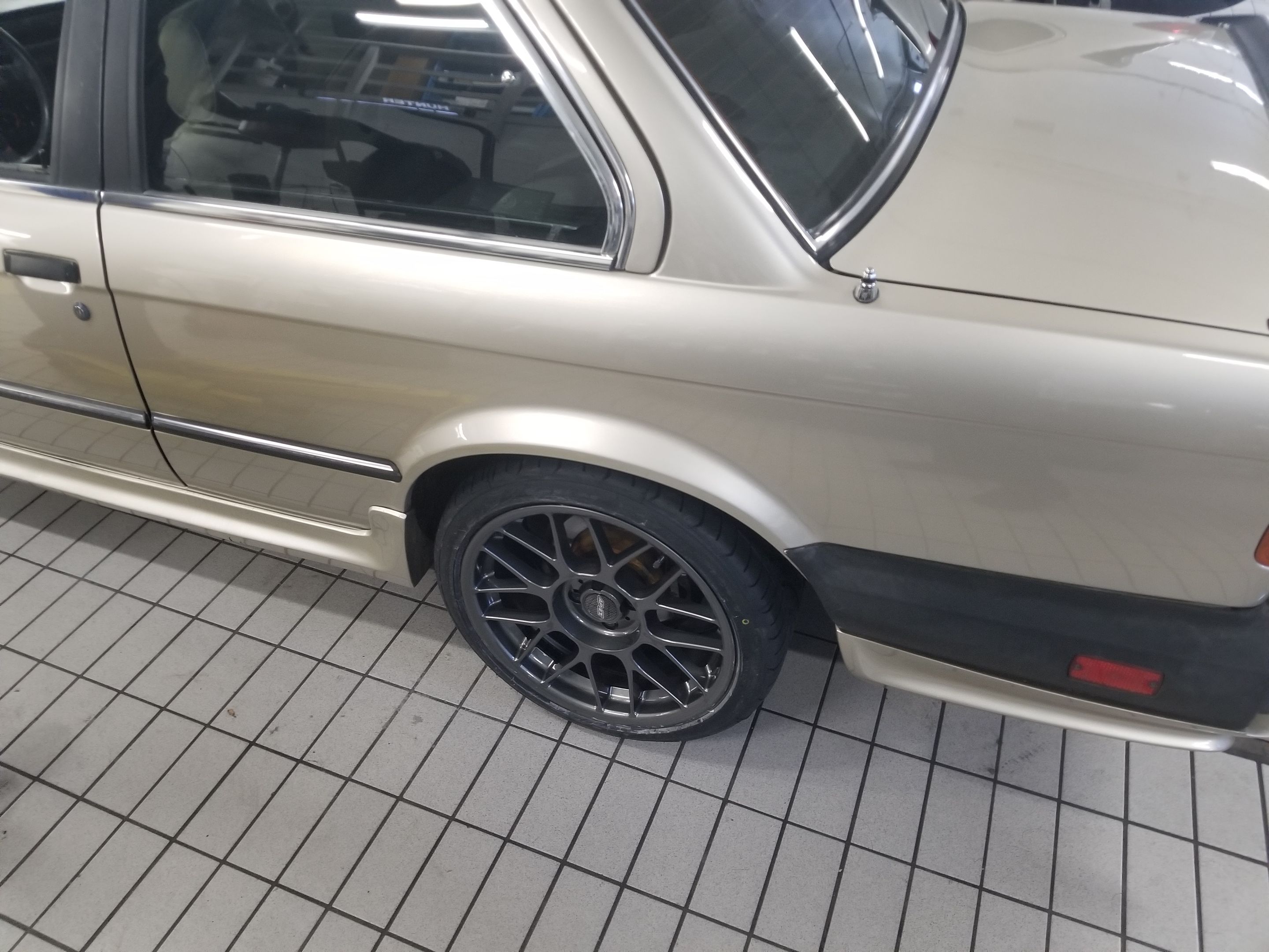 Yellow BMW E30 3 Series with 17" ARC-8 Apex wheels in Anthracite