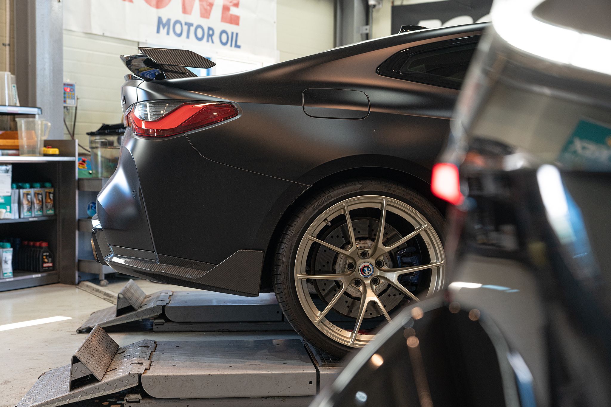 Black BMW G82 Coupe M4 with 19"/20" VS-5RS Apex wheels in Motorsport Gold